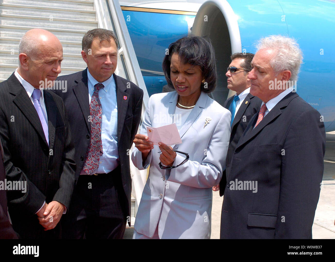 U.S. Secretary of State Condoleezza Rice (C) arrives from Jeddah at Ben Gurion Airport in Israel on August 1, 2007. Welcoming Secretary Rice are U.S. Ambassador to Israel Richard Jones (2nd L) and Chief of Protocol Yitzhak Eldan (R). (UPI Photo/Matty Stern/U.S. Embassy Tel Aviv) Stock Photo