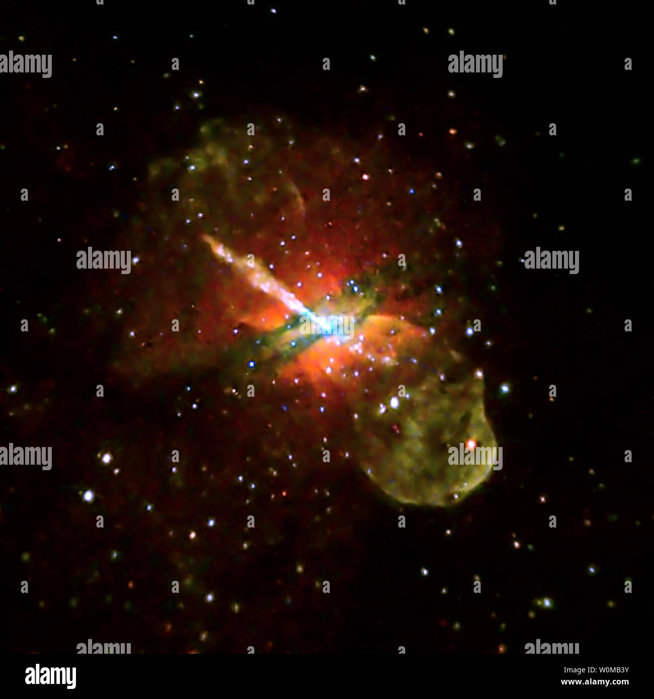 This undated NASA image obtained from the Chandra X-Ray Observatory shows galaxy Centaurus A and an active supermassive black hole. Opposing jets of high-energy particles can be seen extending to the outer reaches of the galaxy, and numerous smaller black holes in binary star systems are also visible. Centaurus A is the nearest galaxy to Earth that contains a supermassive black hole actively powering a jet. (UPI Photo/NASA) Stock Photo