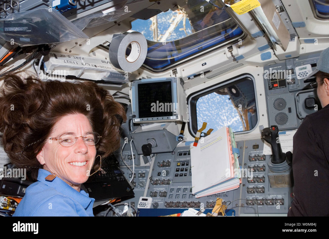 A NASA photo shows teacher/astronaut Barbara R. Morgan on the Space Shuttle Endeavor as it is docked with the International Space Station on August 12, 2007. Morgan transformed the space shuttle and space station into a classroom on August 14 for her first education session from orbit, fulfilling the legacy of Christa McAuliffe, the first teacher/astronaut who was aboard the doomed 1986 Challenger flight. (UPI Photo/NASA) Stock Photo