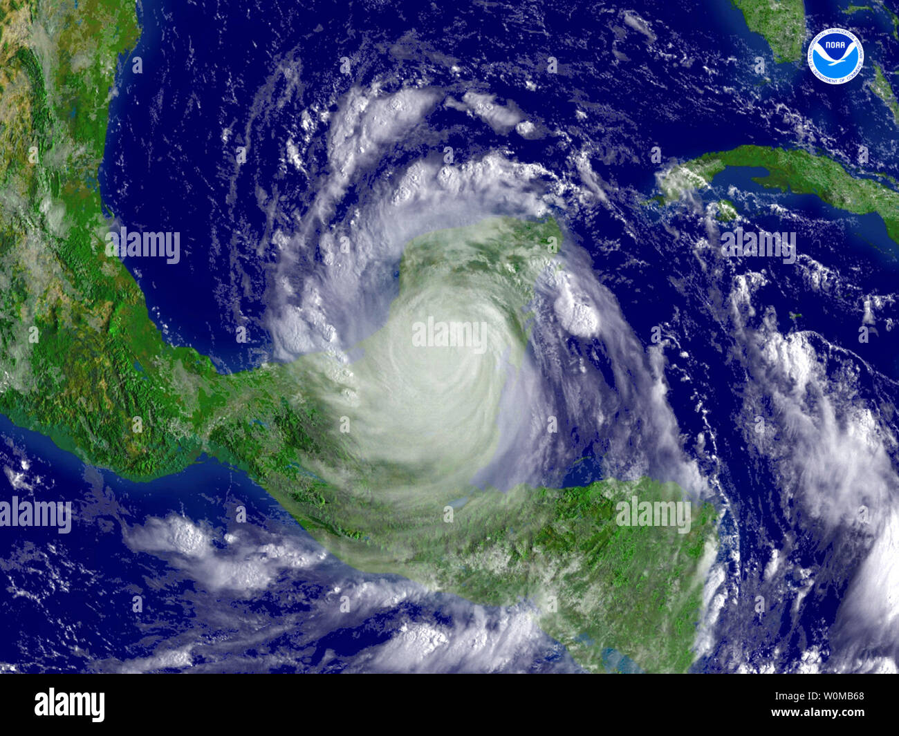 This NOAA satellite image shows Hurricane Dean as it crosses over Mexico's Yucatan peninsula on August 21, 2007. The hurricane, which started as a Category 5 storm over the Caribbean has weakened to a Category 2 after making landfall. (UPI Photo/NOAA) Stock Photo