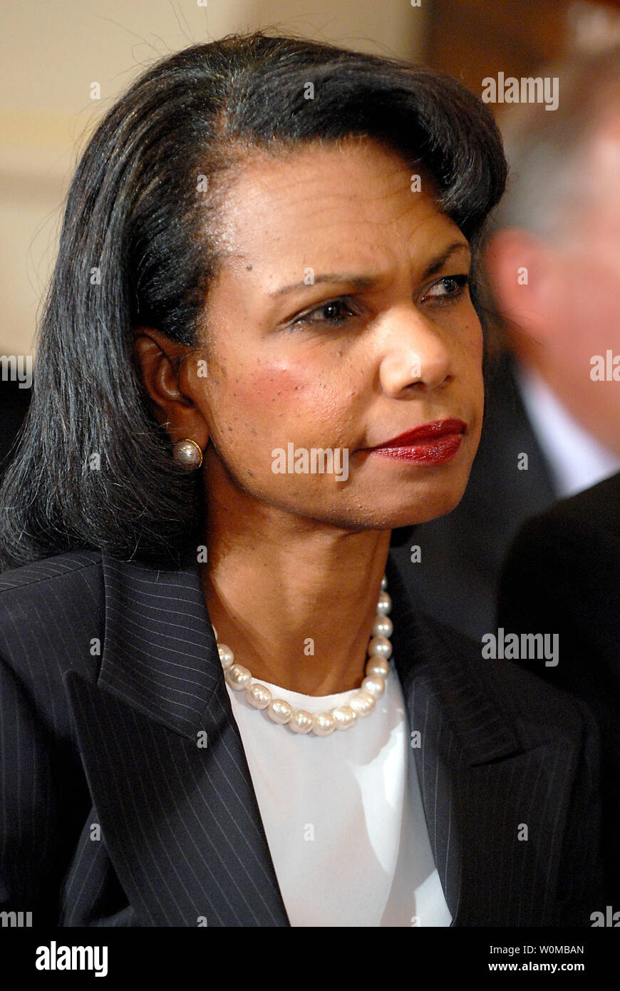 United States Secretary of State Condoleezza Rice listens as United States President George W. Bush makes emarks on Cuba Policy at the United States Department of State in Washington, D.C. on Wednesday, October 24, 2007..Credit: Ron Sachs / Pool via CNP Stock Photo