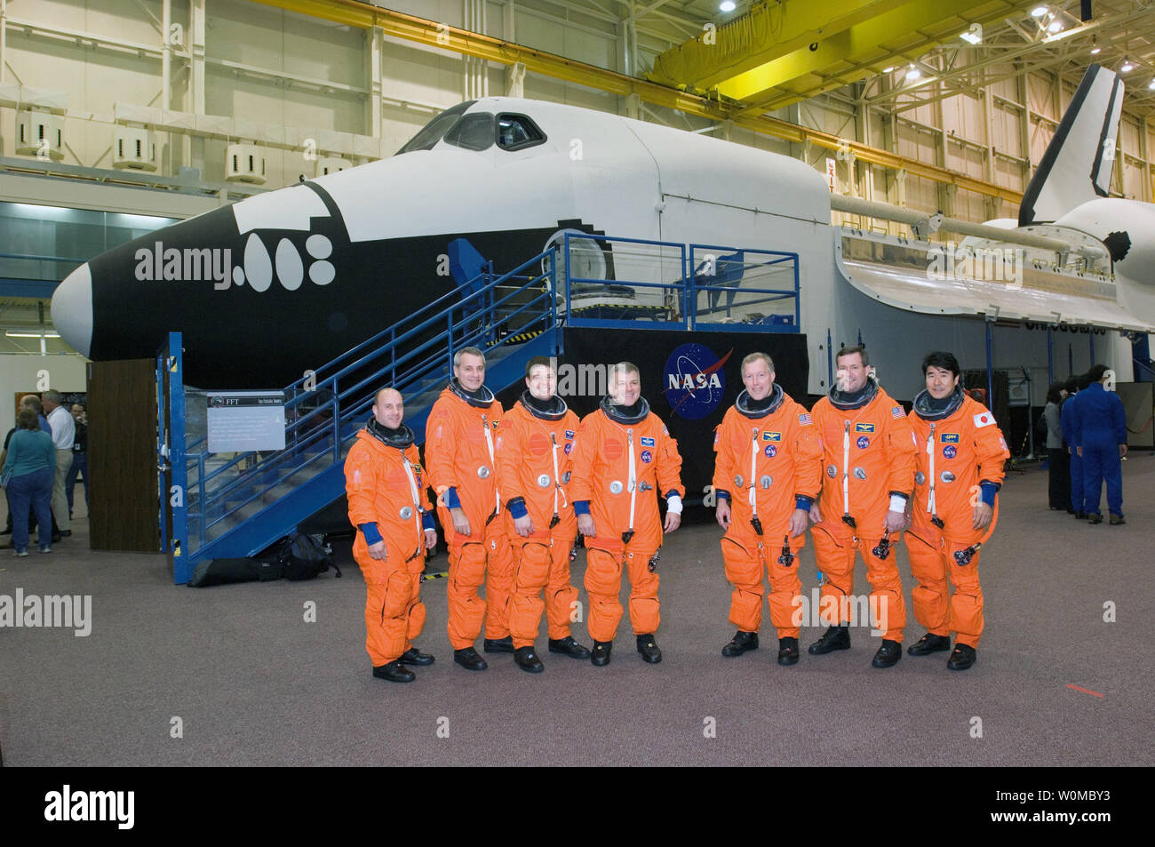 The STS-123 crewmembers are pictured during a training session at the Space Vehicle Mockup Facility at the Johnson Space Center in Houston, Texas on December 19, 2007. From left are astronauts Garrett E. Reisman, Richard M. Linnehan and Robert L. Behnken, all mission specialists; Gregory H. Johnson, pilot; Dominic L. Gorie, commander; Michael J. Foreman and Japan Aerospace Exploration Agency's (JAXA) Takao Doi, both mission specialists. The STS-123 mission crew is scheduled to launch to the International Space Station on Space Shuttle Endeavour on March 11, 2008. (UPI Photo/NASA) Stock Photo