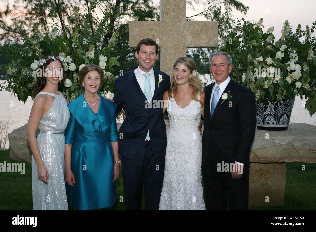 President George W. Bush and Mrs. Laura Bush and Barbara Bush stand with the new Mr. and Mrs. Henry Hager following the young couple's wedding ceremony at Prairie Chapel Ranch Saturday, May 10, 2008, near Crawford, Texas.  Jenna Bush, daughter of President George W. Bush, was married to Henry Hager.   Photo released by White House on May 11th.   (UPI Photo/White House/Shealah Craighead) Stock Photo