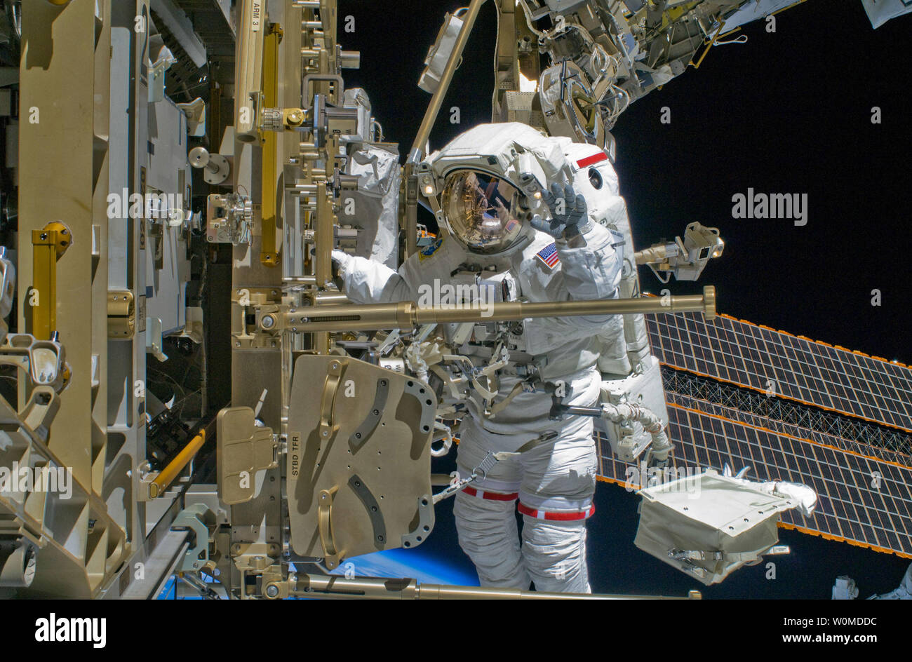 In this November 20, 2008 NASA image Astronaut Shane Kimbrough, STS-126 mission specialists, participates in the mission's second scheduled session of extravehicular activity (EVA) as construction and maintenance continue on the International Space Station. During the six-hour, 45-minute spacewalk, Piper and Kimbrough continued the process of removing debris and applying lubrication around the starboard Solar Alpha Rotary Joint (SARJ), replaced four more of the SARJ's 12 trundle bearing assemblies, relocated two equipment carts and applied lubrication to the station's robotic Canadarm2. (UPI P Stock Photo