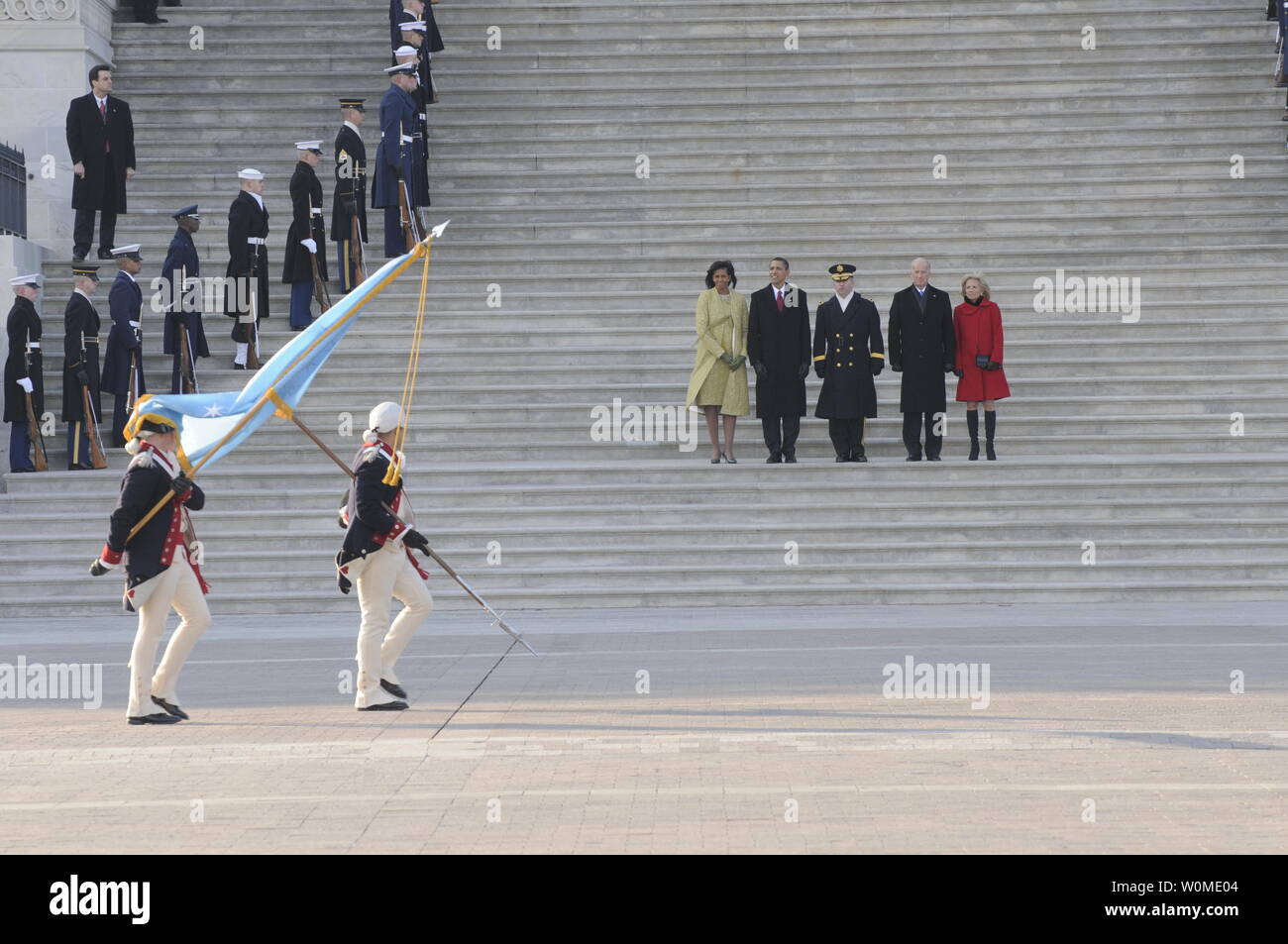 The Commander in Chief's Guard, 3rd U.S. Infantry (The Old Guard) renders honors, as they pass in review for (L to R) First Lady Michelle Obama, U.S. President Barack Obama, Maj. Gen. Richard J. Rowe Jr., Vice President Joe Biden and Jill Biden prior to the Inaugural Parade after Obama's swearing-in ceremony in Washington January 20, 2009. The review and escort to the White House following the 56th Presidential Inauguration harks back to the escort provided George Washington on his 1789 inauguration.  (UPI Photo/Kyle Niemi/U.S. Coast Guard) Stock Photo