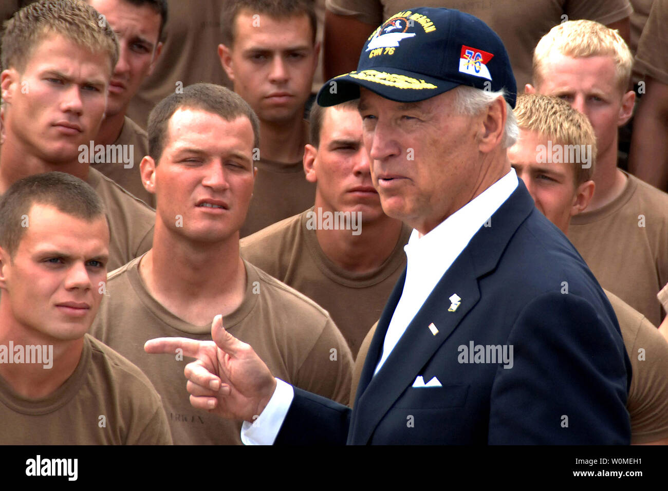 Vice President Joe Biden talks with Basic Underwater Demolition/SEAL (BUD/S) candidates on the beach at the Naval Special Warfare Center in San Diego on May 14, 2009. (UPI Photo/Dominique M. Lasco/U.S. Navy) Stock Photo