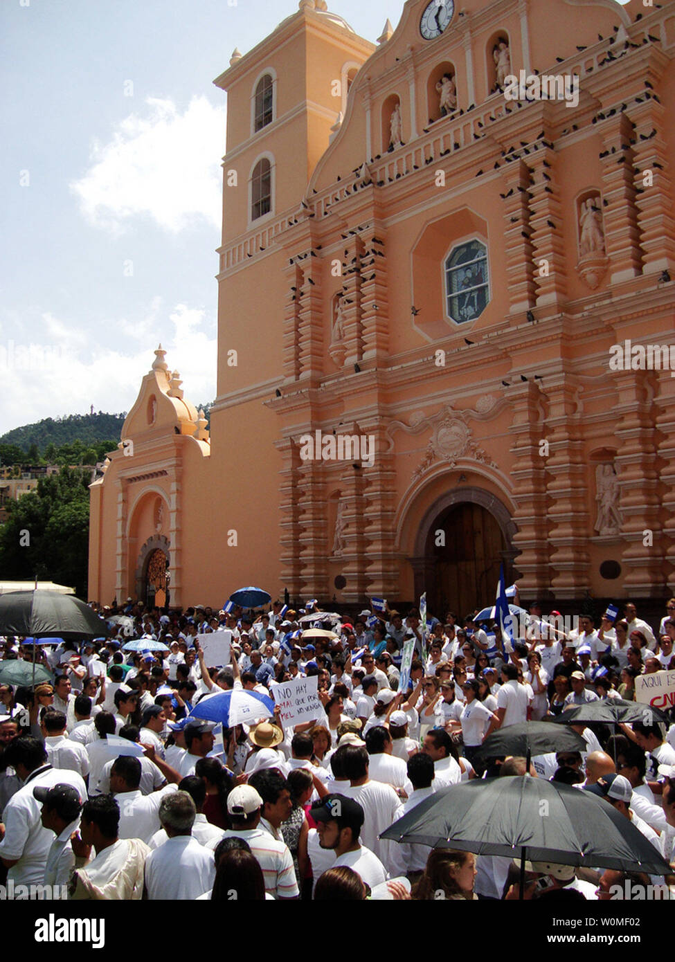 Hondurans participate in a rally against the return of ousted Honduran President Manuel Zelaya during a rally at the central park in Tegucigalpa, Tuesday June 30, 2009. (UPI Photo/Ek Balam) Stock Photo