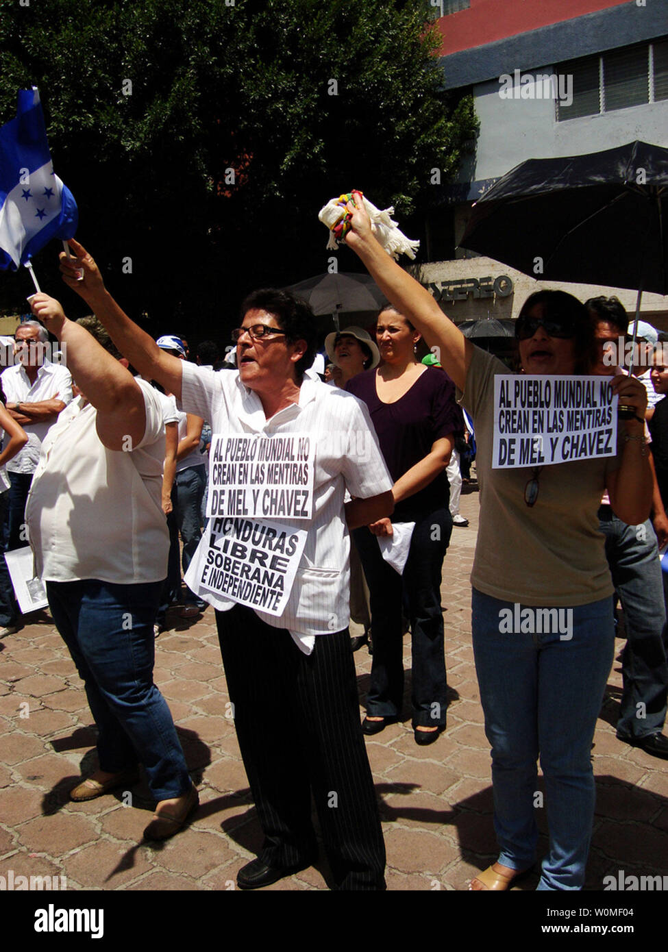 Hondurans participate in a rally against the return of ousted Honduran President Manuel Zelaya during a rally at the central park in Tegucigalpa, Tuesday June 30, 2009. (UPI Photo/Ek Balam) Stock Photo