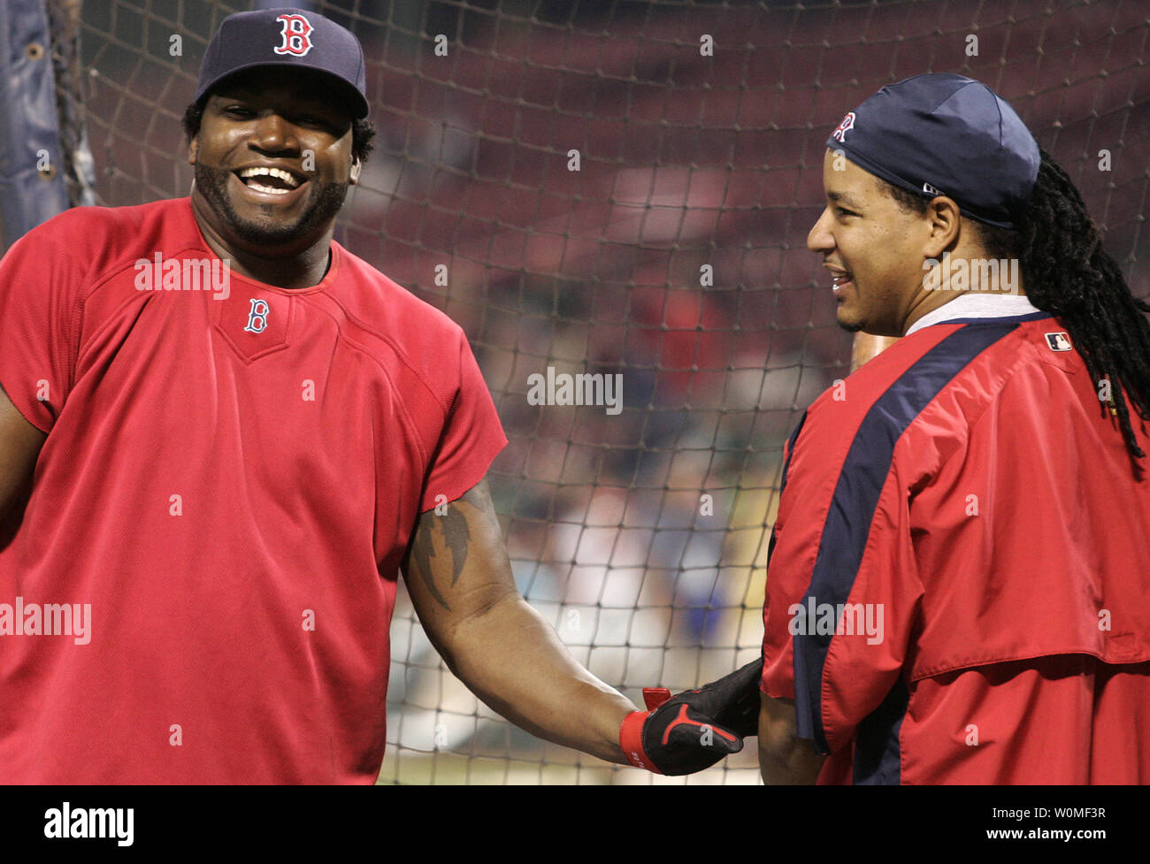 Boston Red Sox David Ortiz  confirmed a report on July 30, 2009 that he  tested positive for performance-enhancing drugs in 2003.  Teammate at the time Manny Ramirez  was also implicated.   Both sluggers guided the Boston Red Sox to World Series victories in 2004 and 2007.  In this file photo, Ortiz (L) jokes around with left fielder Manny Ramirez before the start of game two of the American League Division Series against the Los Angeles Angels at Fenway Park in Boston on October 5, 2007.  UPI Photo/Matthew Healey/Files Stock Photo