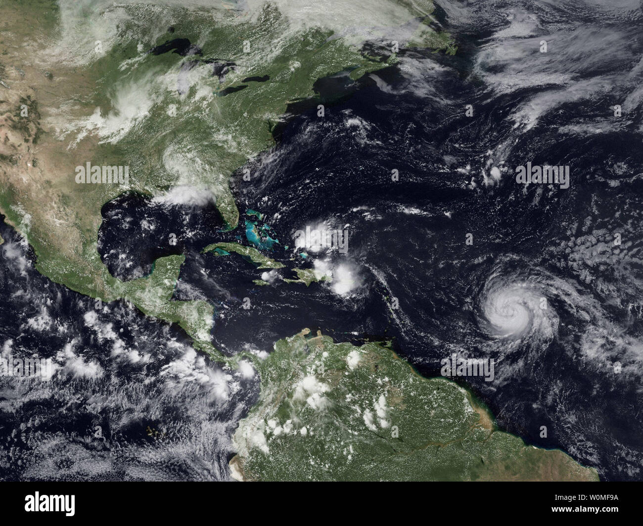 This NOAA Satellite image released on August 17, 2009 shows Tropical Depression Ana near Puerto Rico, Hurricane Bill west of the Lesser Antilles and the remnants of Tropical Storm Claudette over the Florida panhandle and Alabama.  UPI/NOAA Stock Photo