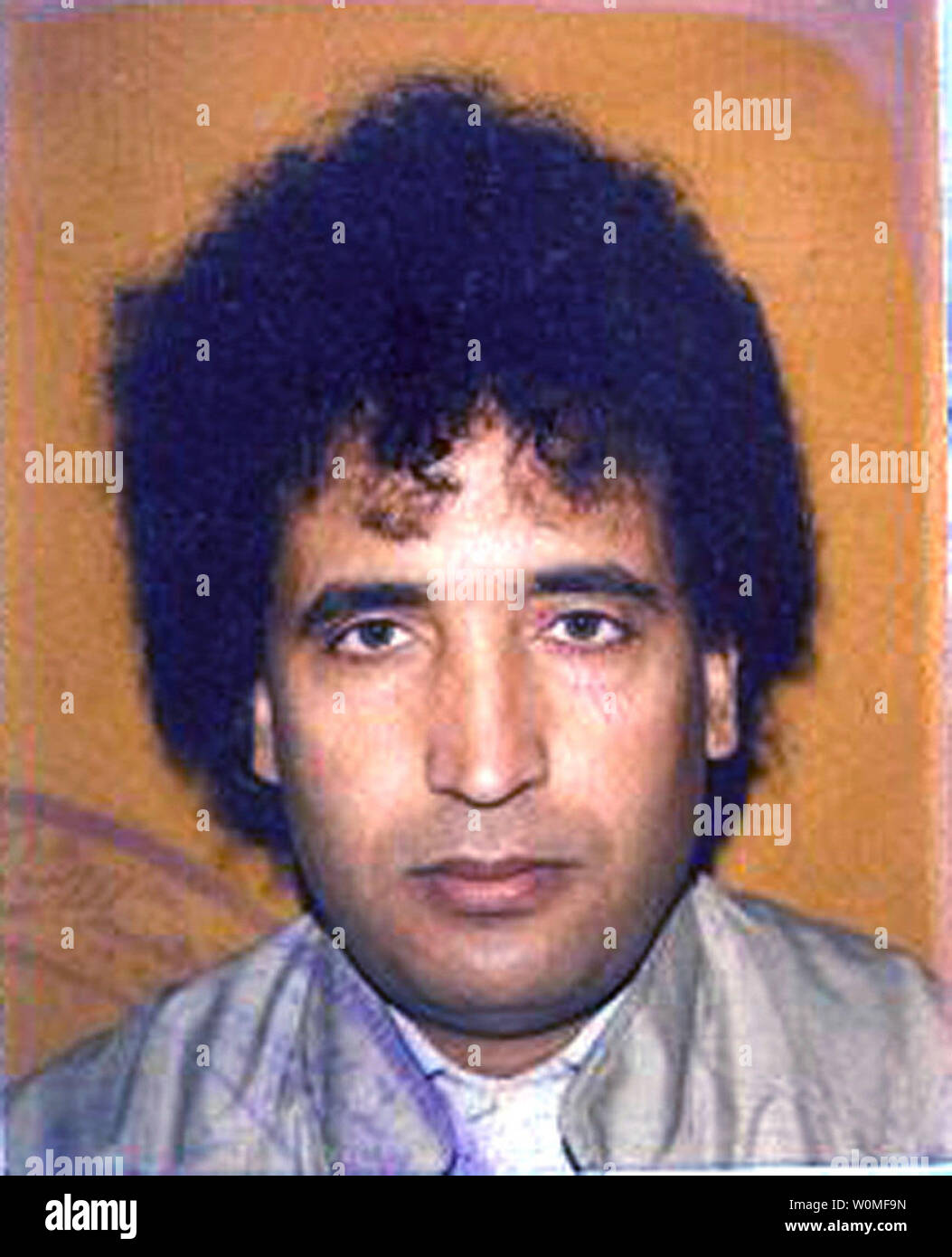 In a photo released by the Crown Office, Lockerbie bomber Abdel Basset al-Megrahi, the Libyan man who was convicted of the deadly 1988 bombing of Pan Am Flight 103,  is shown in his passport picture on August 20, 2009.  Al-Megrahi, diagnosed with terminal cancer, was released today by Scottish officials on compassionate grounds and returned to Libya.   UPI/Crown Office Stock Photo