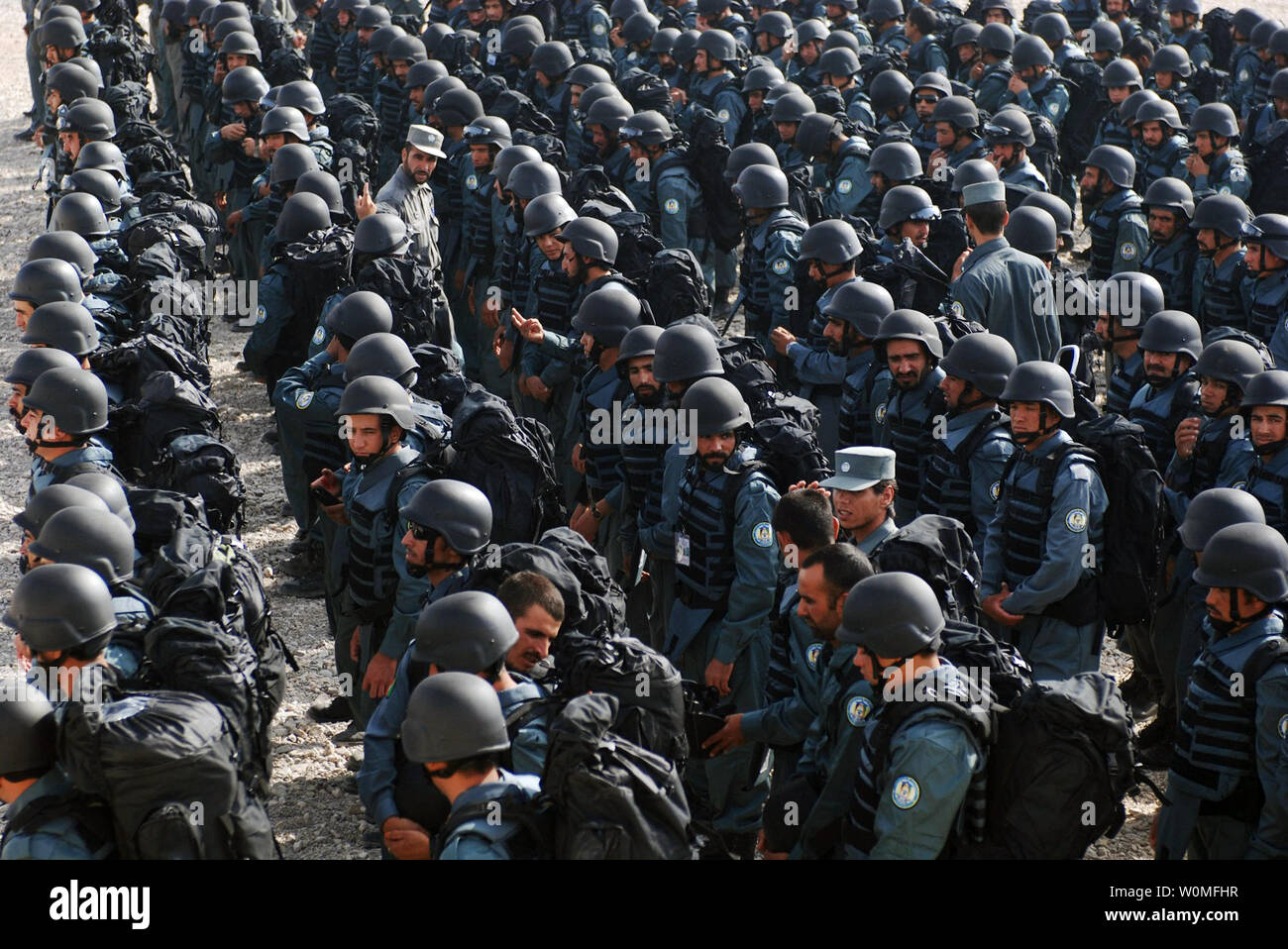 Afghan National Police (ANP) prepare to graduate from a police academy at the ANP headquarters in Herat, Afghanistan on October 29, 2009. Hundreds of graduates were part of an initiative to double the size of the ANP to 160,000 police by 2013. UPI/Stephen Decatur/U.S. Army Stock Photo