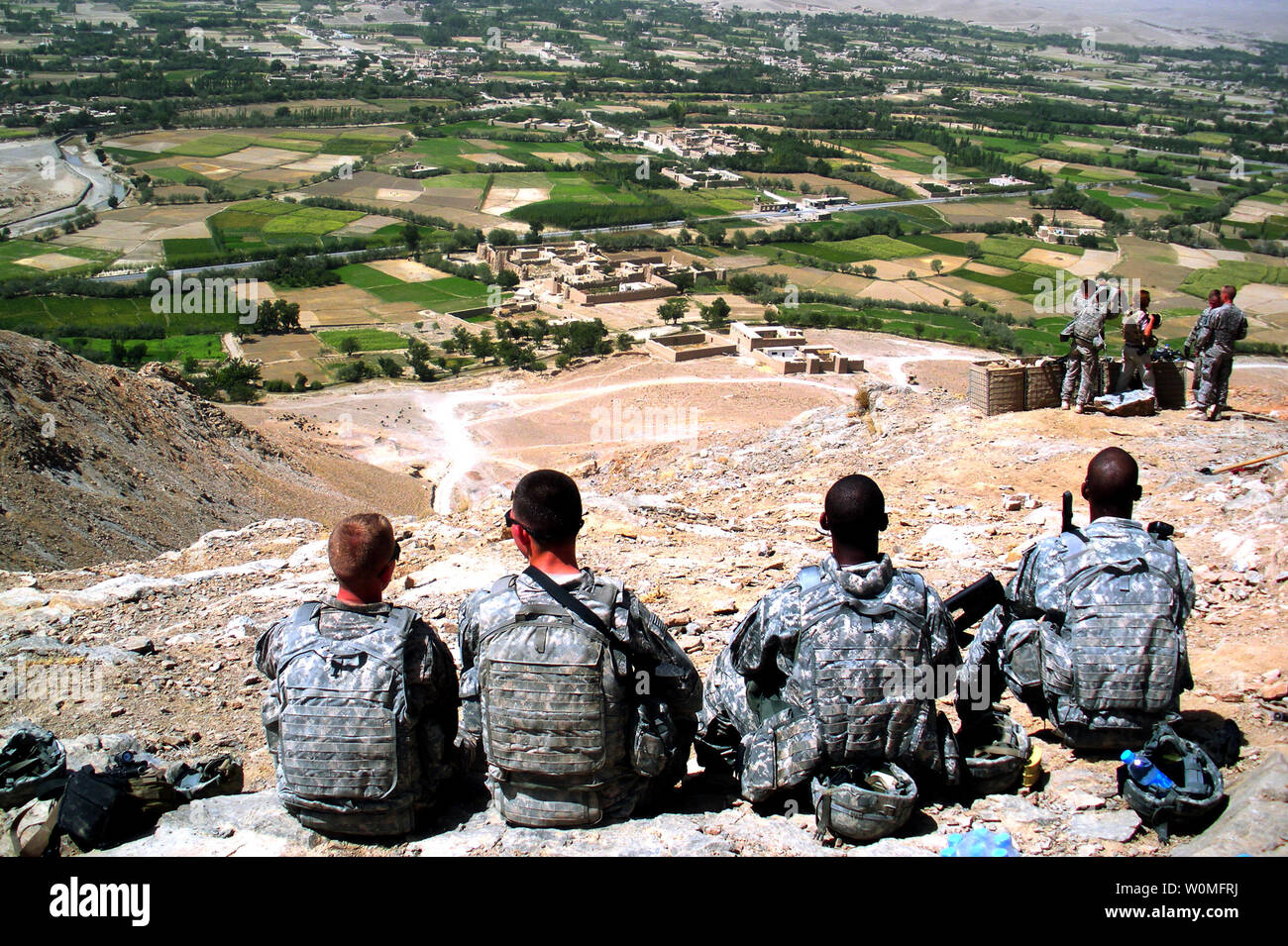 U.S. Army Soldiers from HHT TAC Platoon, 3-71 Cavalry, 3/10th Mountain Division rest atop of OP Spur in Logar, Afghanistan on September 8, 2009, prior to resupplying OP Spur. UPI/Wayne Gray/U.S. Army Stock Photo