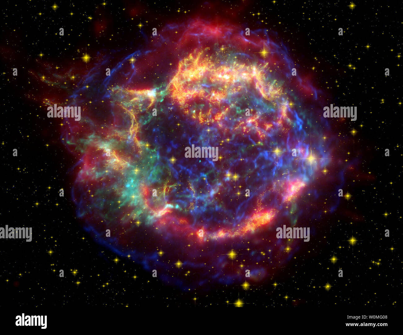 This June 9, 2005 NASA false-color picture shows the supernova remnant of Cassiopeia A. This image is made up of images taken by NASA's, Spitzer Space Telescope, Hubble Space Telescope and the Chandra X-ray Observatory.   UPI/NASA Stock Photo