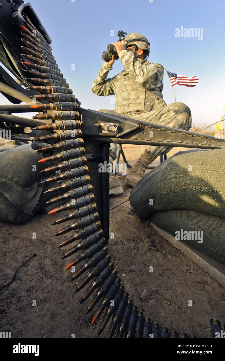 U.S. Army Pfc. Stephen Atwood from Alpha Company, 1st Battalion, 17th Infantry Regiment scouts for enemy activity during Operation Helmand Spider, Badula Qulp, Helmand province, Afghanistan on February 13, 2010. UPI/Efren Lopez/U.S. Air Force Stock Photo