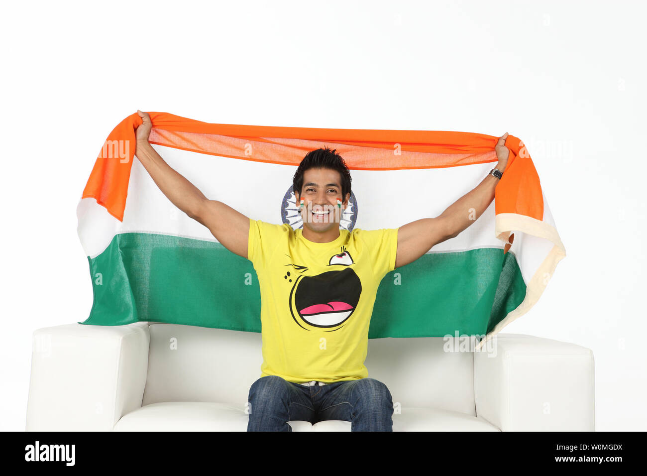 Man with Indian flag painted on cheeks Stock Photo