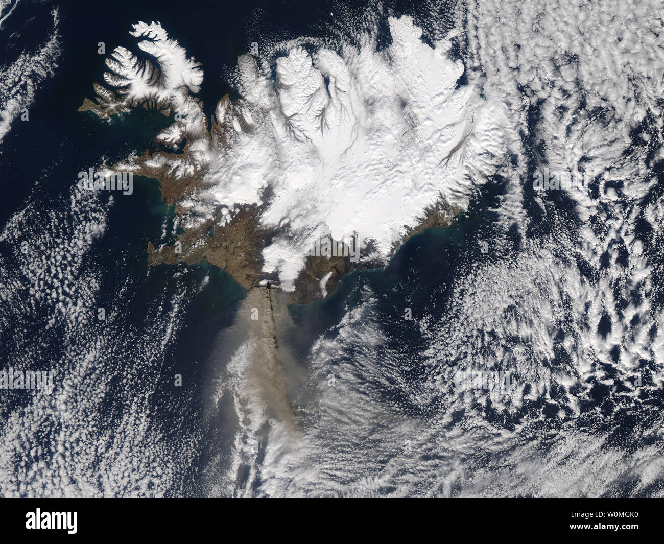 Thick ash poured from Iceland Eyjafjallajškull volcano when the Moderate Resolution Imaging Spectroradiometer (MODIS) on NASA's Aqua satellite acquired this image on April 17, 2010. The ash in this image is at two different altitudes. A concentrated plume rises over a more diffuse cloud of ash, casting a dark shadow on the ash below. The volcano had been emitting ash in puffs that reached between 16,000 and 24,000 feet, according to the Icelandic Met Office. The higher plume seen here is likely from a more explosive event.     UPI/NASA Stock Photo