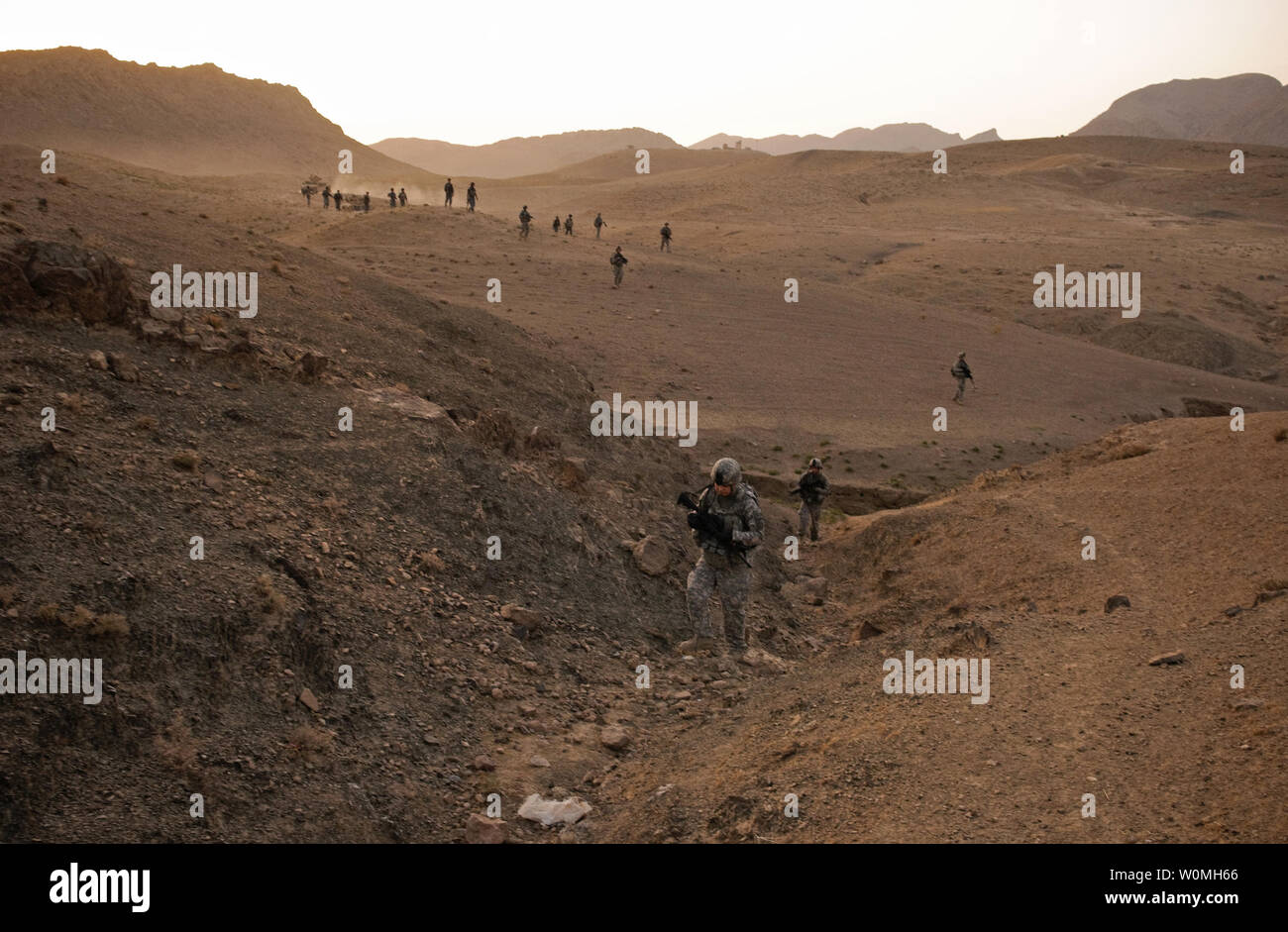 U.S. and Afghan forces conduct a dismounted patrol near Combat Outpost Mizan, Mizan District, Zabul Province, in Afghanistan on August 19, 2010.  UPI/Nathanael Callon/U.S. Air Force Stock Photo
