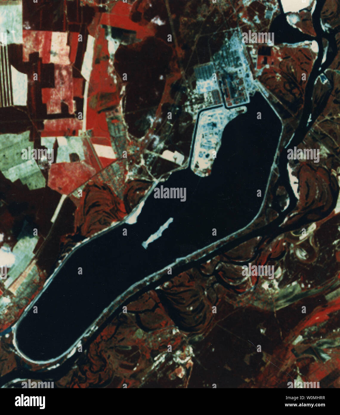 This Landsat 5 Thematic Mapper image shows the area in which the damaged Chernobyl nuclear power plant is located. This photo was taken at approximately 9:45 a.m. Kiev time on April 29, 1986. The plant, damaged by the accident on April 26, 1986, is located at the left side of the cooling pond in the center of the rectangular shaped area just at the end of the watercooling inlet. UPI Stock Photo