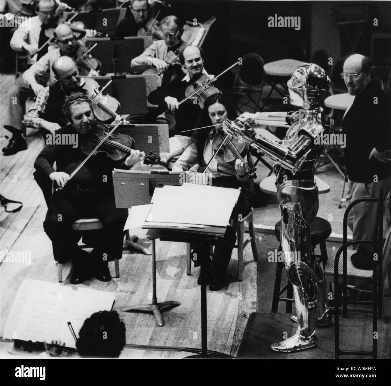 May 4th is the unofficial holiday established by Star Wars fans to celebrate the culture established by the landmark films. Based on the popular quote from the films, 'May the force be with you', fans commonly say 'May the fourth be with you' on this day. In this UPI file photo, John Williams (R), watches C-3PO, a human-shaped, protocol droid, take a hand at conducting the Boston Pops during rehearsal. Williams wrote the score for all six Star Wars films. UPI/Files Stock Photo
