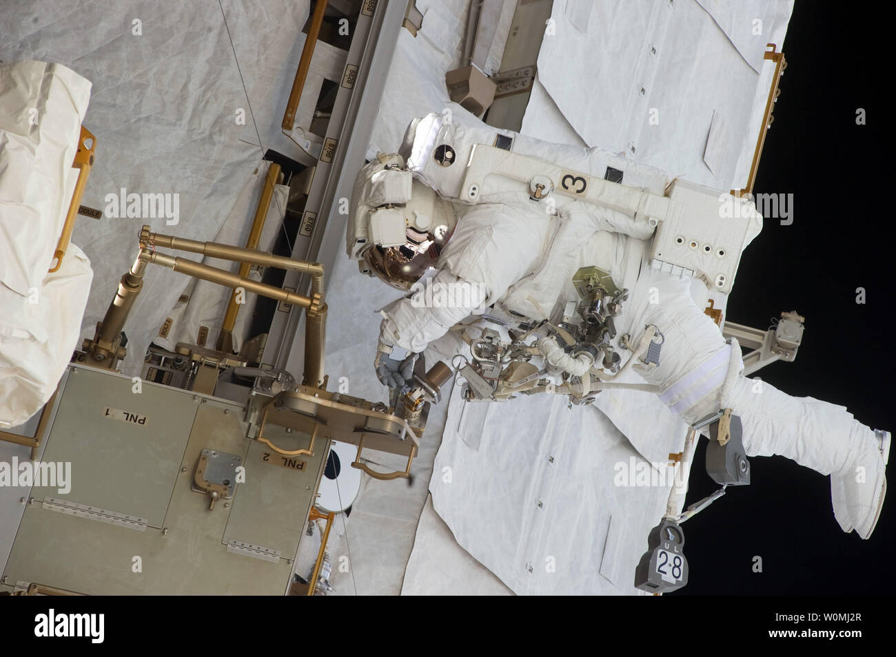 NASA astronaut Michael Fincke participates in the mission's fourth session of extravehicular activity (EVA) as construction and maintenance continue on the International Space Station on May 27, 2011. This is expected to be the very last spacewalk to be performed by shuttle crew astronauts.    UPI/NASA Stock Photo
