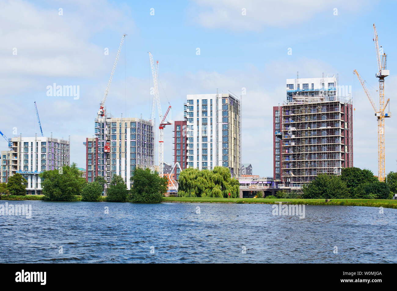 New apartment buildings under construction on the edge of Walthamstow Wetlands, North London UK Stock Photo