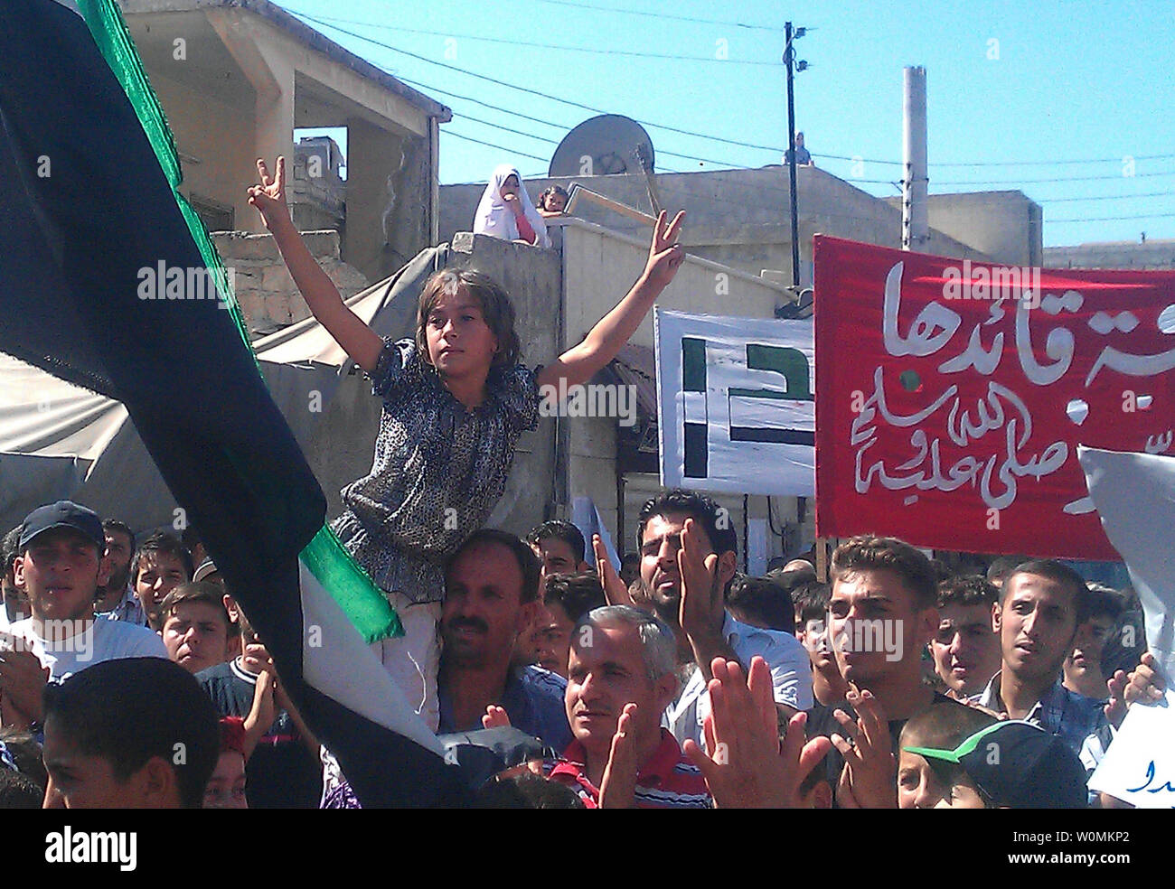 In this photo provided by the Syrian citizen Shaam News Network (SNN), Syrians rally against the army of  President Bashar Hafez al-Assad in Sarmada, Idlib province, Syria on September 28, 2012.   (Editors Note: SNN is a Syrian citizens outlet and the accuracy of the images cannot be immediately confirmed by UPI).   UPI/SNN Stock Photo