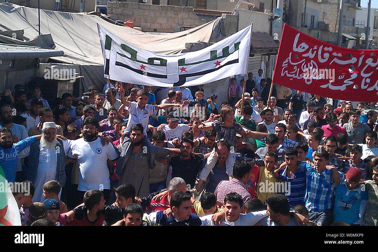 In this photo provided by the Syrian citizen Shaam News Network (SNN), Syrians rally against the army of  President Bashar Hafez al-Assad in Sarmada, Idlib province, Syria on September 28, 2012.   (Editors Note: SNN is a Syrian citizens outlet and the accuracy of the images cannot be immediately confirmed by UPI).   UPI/SNN Stock Photo