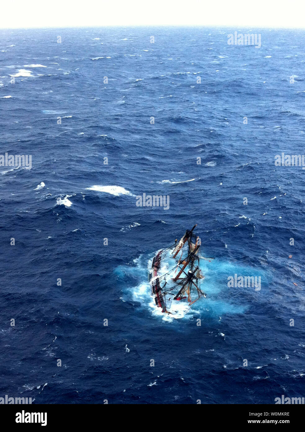 The HMS Bounty, a 180-foot sailboat, is shown submerged in the Atlantic Ocean during Hurricane Sandy approximately 90 miles southeast of Hatteras, N.C., Monday, October 29, 2012. Of the 16-person crew, the Coast Guard rescued 14, recovered one body and is searching for the captain of the vessel.   UPI/Tim Kuklewski/Coast Guard Stock Photo