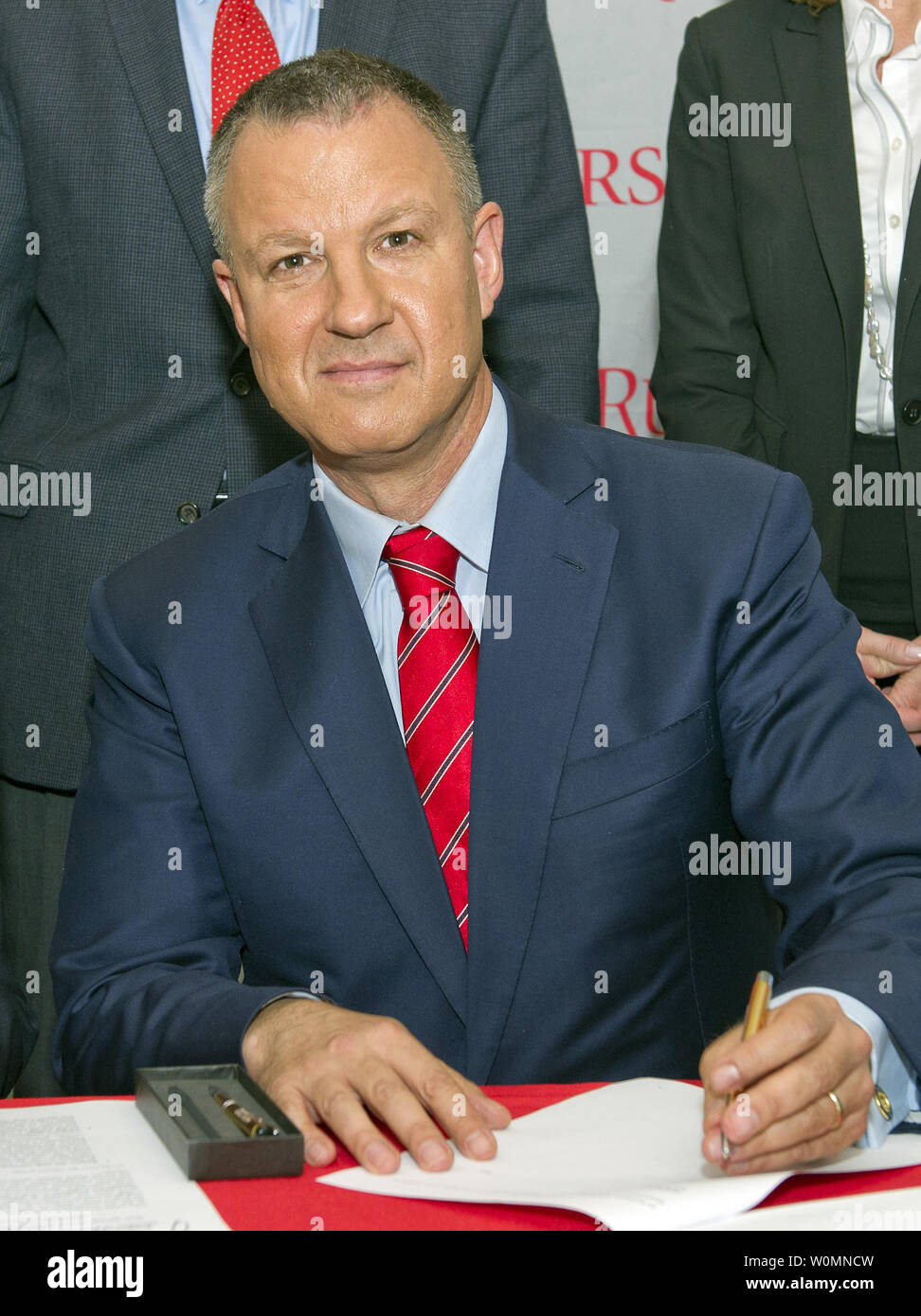 Erel Margalit, Member of Israel's Knesset, and its Economic Development Taskforce, announces the New Jersey-Israel Healthy, Functional and Medical Foods Alliance at a signing ceremony at Rutgers University in New Brunswick, New Jersey, Friday, September 18, 2015. The alliance between Rutgers and Tel-Hai College in Israel's Galilee region, Margalit said, will focus on the science of using food as a way to tackle obesity, and manage diabetes, food allergies, and other health problems. The parties will collaborate on scientific research, technology commercialization, and business incubation, and Stock Photo