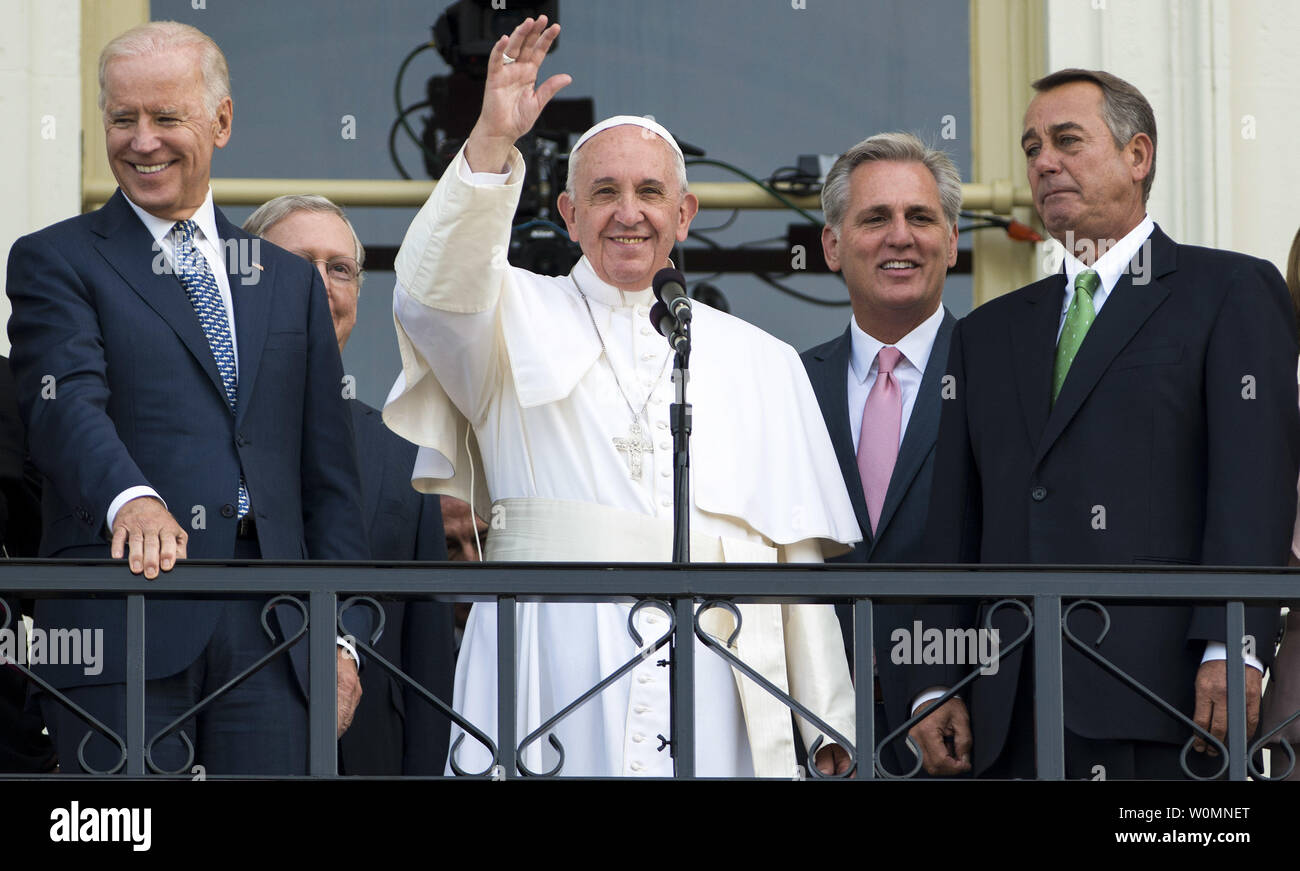 Pope Francis addresses a crowd from the Speakers Balcony with Vice President Joe Biden, House Majority Leader Kevin McCarthy, and Speaker of the House John Boehner on September 24, 2015 in Washington, DC.   Photo by Leigh Vogel/UPI Stock Photo