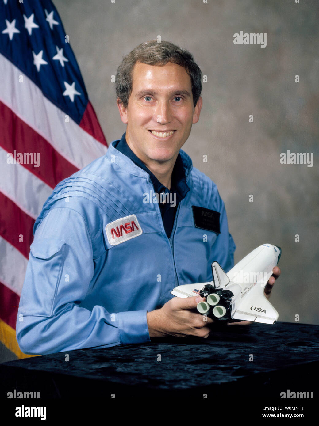 Official NASA portrait, taken on January 8, 1981, of astronaut Michael J. Smith, Pilot for STS-51-L. On January 28, 1986, at 11:39 a.m. EST, the Space Shuttle Challenger and her seven-member crew were lost when a ruptured O-ring in the right Solid Rocket Booster caused an explosion 73 seconds after launch. UPI Stock Photo
