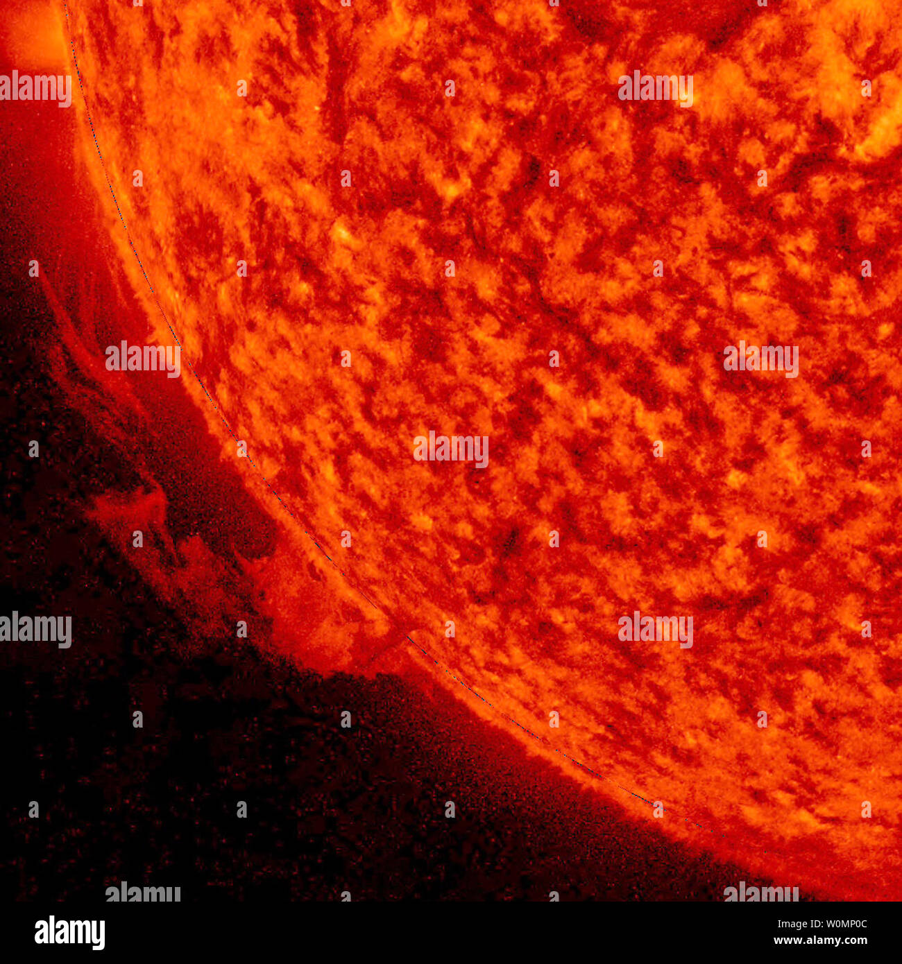 An elongated solar prominence rose up above the Sun and slowly unraveled over 17 hours on February 3, 2016. Prominences are clouds of gas suspended above the Sun by magnetic forces. You can see the plasma streaming along the magnetic field lines before it thins out and gradually breaks away from its tethers. The images were taken in a wavelength of extreme ultraviolet light. NASA/UPI Stock Photo