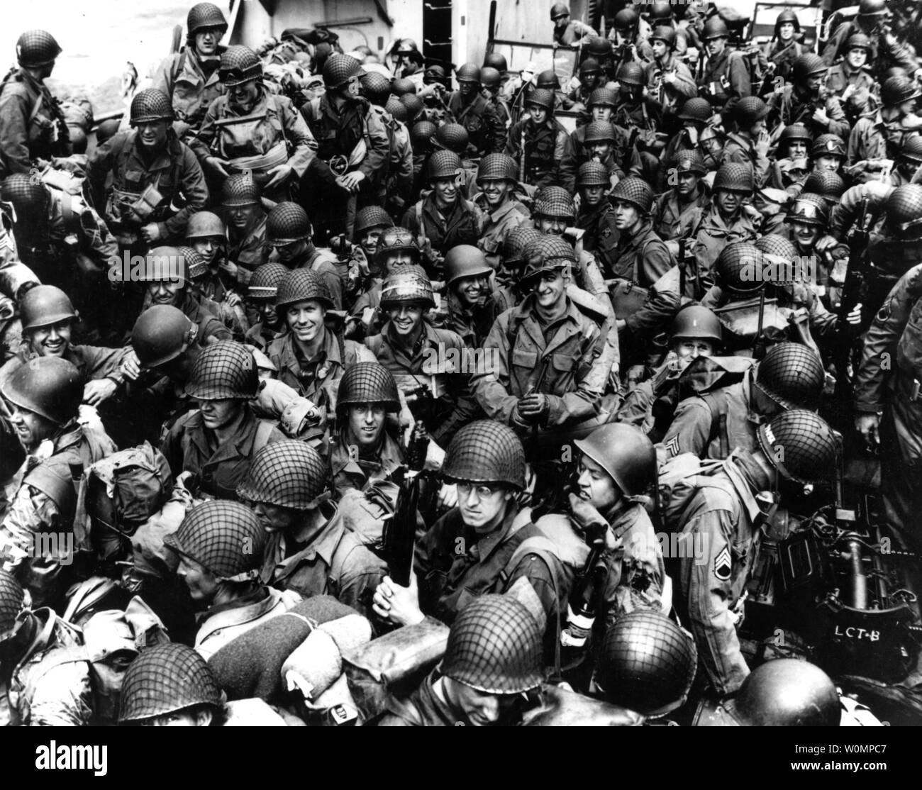 Army troops on board a LCT, ready to ride across the English Channel to France to take part in the Allied invasion of German-occupied France. Some of these men wear 101st Airborne Division insignia. Photograph released June 12, 1944. Photo by U.S. Navy/National Archives/UPI Stock Photo