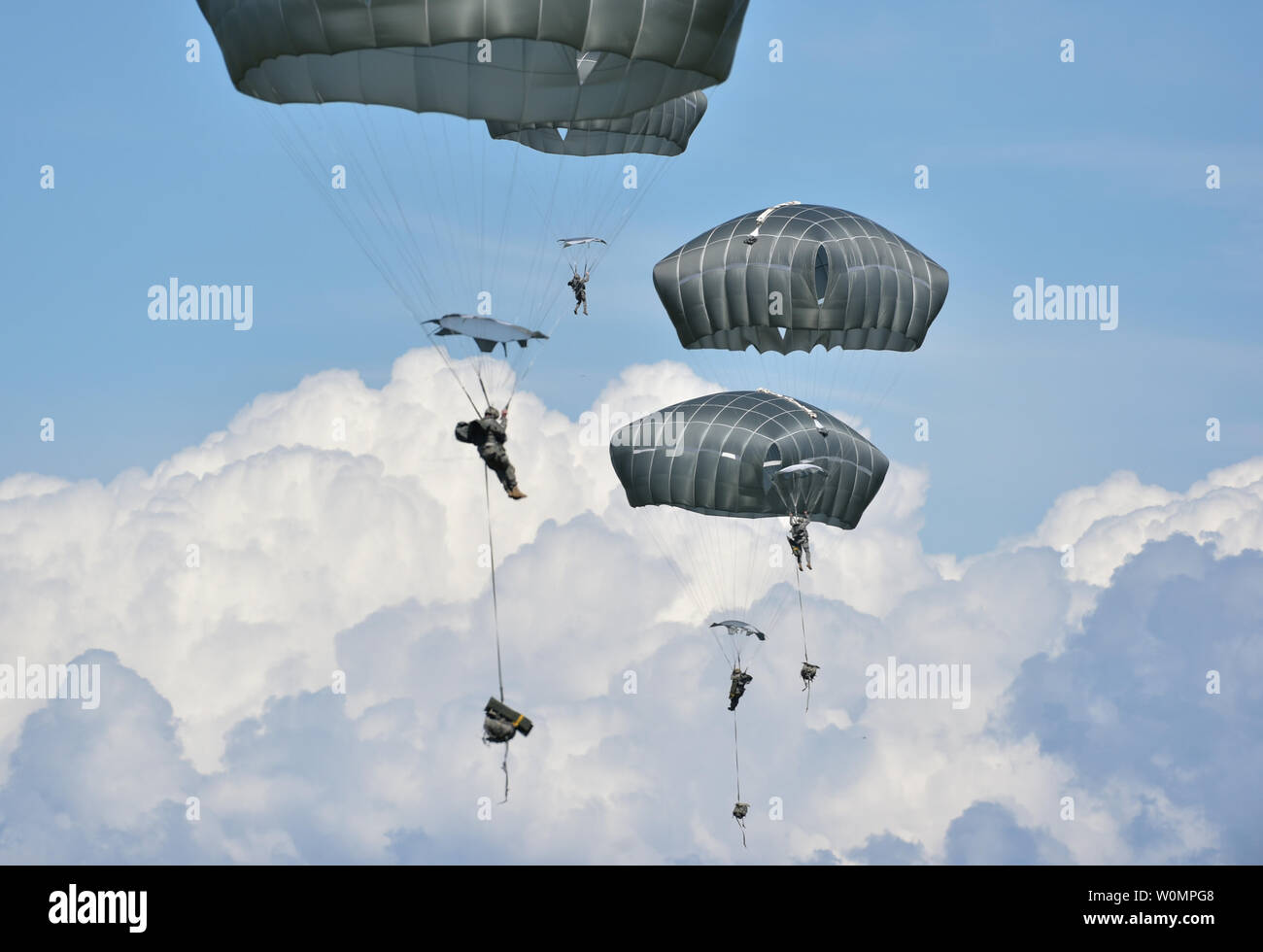 Paratroopers assigned to the 4th Infantry Brigade Combat Team (Airborne), 25th Infantry Division, U.S. Army Alaska, execute an airborne proficiency operation at Joint Base Elmendorf-Richardson, Alaska, June 9, 2016, during Exercise Arctic Aurora. Arctic Aurora is a yearly bilateral training exercise involving elements of the Spartan Brigade and the Japan Ground Self-Defense Force, which focuses on strengthening ties between the two by executing combined small unit airborne proficiency operations and basic small arms marksmanship. Photo by Justin Connaher/U.S. Air Force/UPI Stock Photo