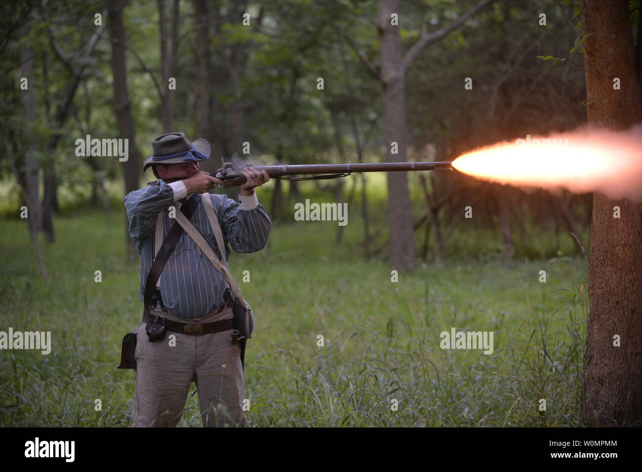 Steve Brown, an Air Force and Army combat veteran, fires his rifle during the 153rd anniversary of the Battle of Battle of Gettysburg on July 3, 2016. Brown served as a Technical Sergeant in the Air Force Security Forces before joining the Army and earning a commission. During that time, Brown was wounded twice in combat, ultimately losing all feeling in one leg. Photo by Christopher S. Muncy/U.S. Air National Guard/UPI Stock Photo