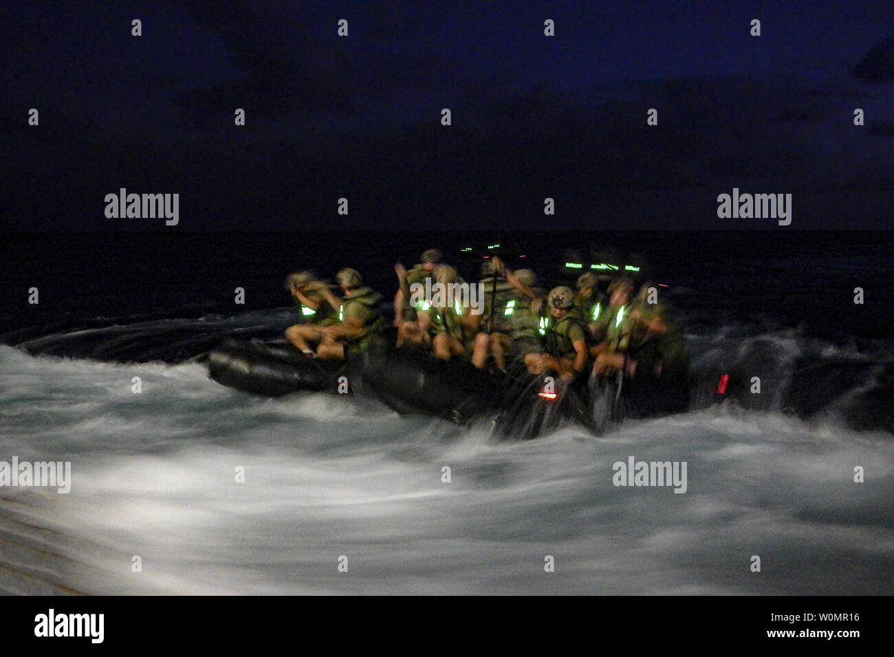 U.S. Marines assigned to Company F, Battalion Landing Team, 2nd Battalion, 4th Marines, 31st Marine Expeditionary Unit use combat rubber raiding craft to conduct a launch-and-recovery exercise from the well deck of the USS Green Bay (LPD-20), at sea, on August 29, 2016. The 31st MEU is task-organized to address a wide variety of military operations in the Asia-Pacific region, from force projection and maritime security to humanitarian assistance and disaster relief. Photo by Darien J. Bjorndal/U.S. Marine Corps/UPI Stock Photo