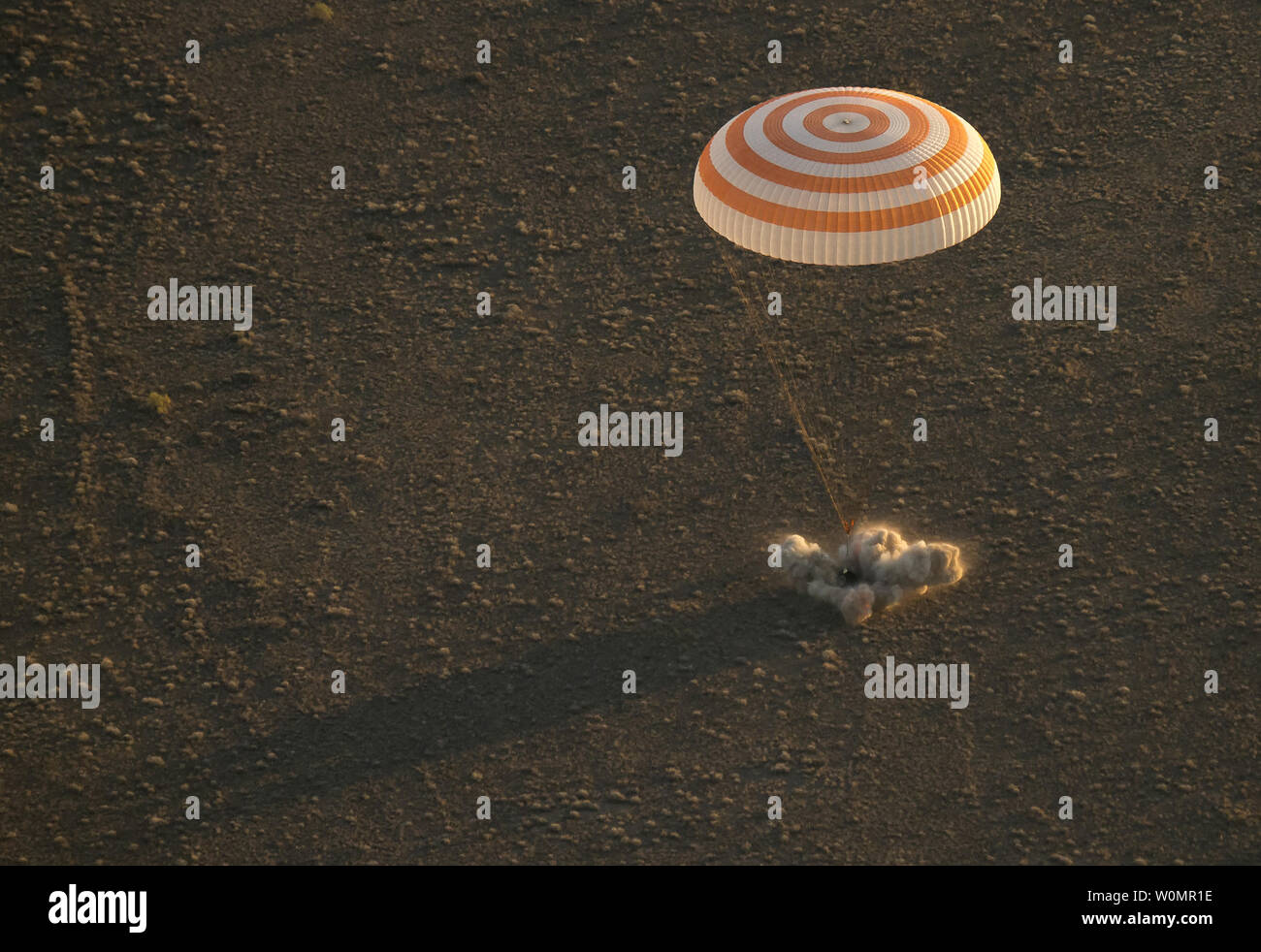 The Soyuz TMA-20M spacecraft is seen as it lands with Expedition 48 crew members NASA astronaut Jeff Williams, Russian cosmonauts Alexey Ovchinin, and Oleg Skripochka of Roscosmos near the town of Zhezkazgan, Kazakhstan on Wednesday, Sept. 7, 2016(Kazakh time). Williams, Ovchinin, and Skripochka are returning after 172 days in space where they served as members of the Expedition 47 and 48 crews onboard the International Space Station.   NASA Photo by Bill Ingalls/UPI Stock Photo