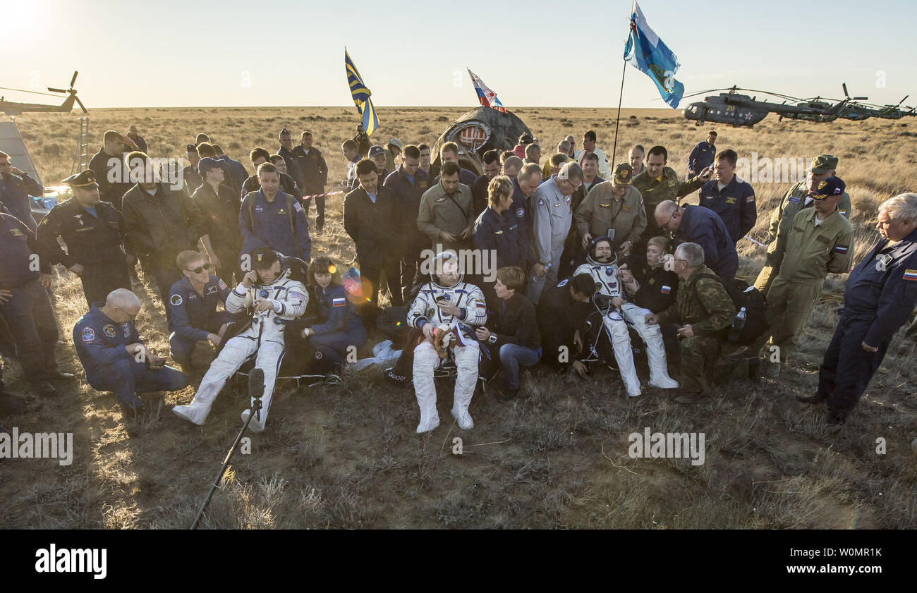 NASA astronaut Jeff Williams, left, Russian cosmonaut Alexey Ovchinin of Roscosmos, center, and Russian cosmonaut Oleg Skripochka of Roscosmos sit in chairs outside the Soyuz TMA-20M spacecraft a few moments after they landed in a remote area near the town of Zhezkazgan, Kazakhstan on Wednesday, Sept. 7, 2016(Kazakh time).  Williams, Ovchinin, and Skripochka are returning after 172 days in space where they served as members of the Expedition 47 and 48 crews onboard the International Space Station.   NASA Photo by Bill Ingalls/UPI Stock Photo
