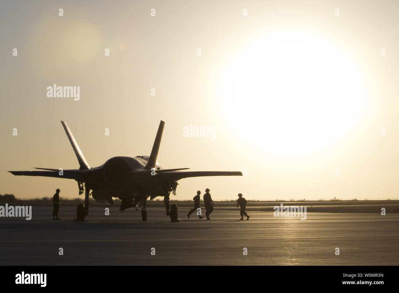 U.S. Marines with Marine Fighter Attack Squadron 121 (VMFA-121), 3rd Marine Aircraft Wing, conduct the first hot load on a F-35B Lightning II in support of Weapons and Tactics Instructors (WTI) 1-17 at Marine Corps Air Station Yuma, Ariz., September 22, 2016. Photo by Aaron James Vinculado/U.S. Marine Corps/UPI Stock Photo