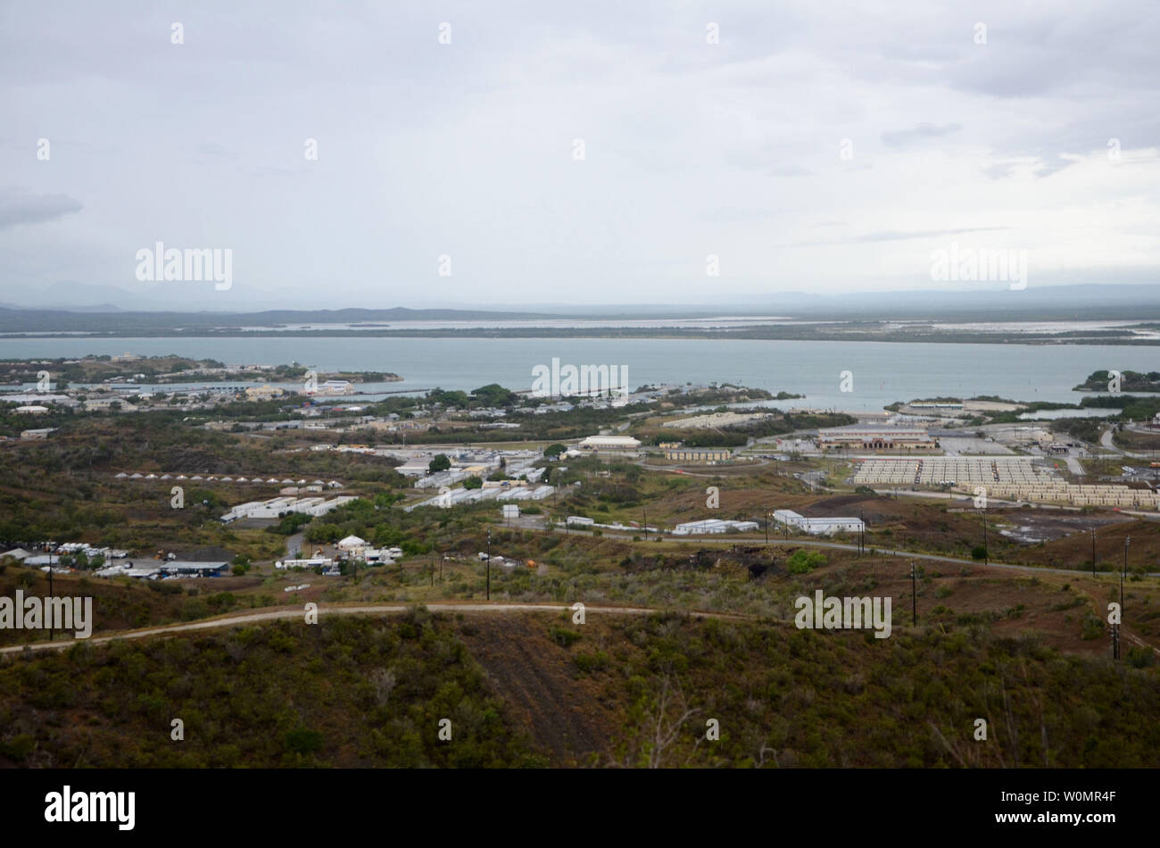 Overall view of Naval Station Guantanamo Bay from John Paul Jones Hill on the morning of October 5, 2016, the day after Hurricane Matthew hit. Matthew was a Category 4 hurricane with maximum sustained wind speeds of 145 mph and wind gusts of 170 mph. Photo by Kegan E. Kay/U.S. Navy/UPI Stock Photo