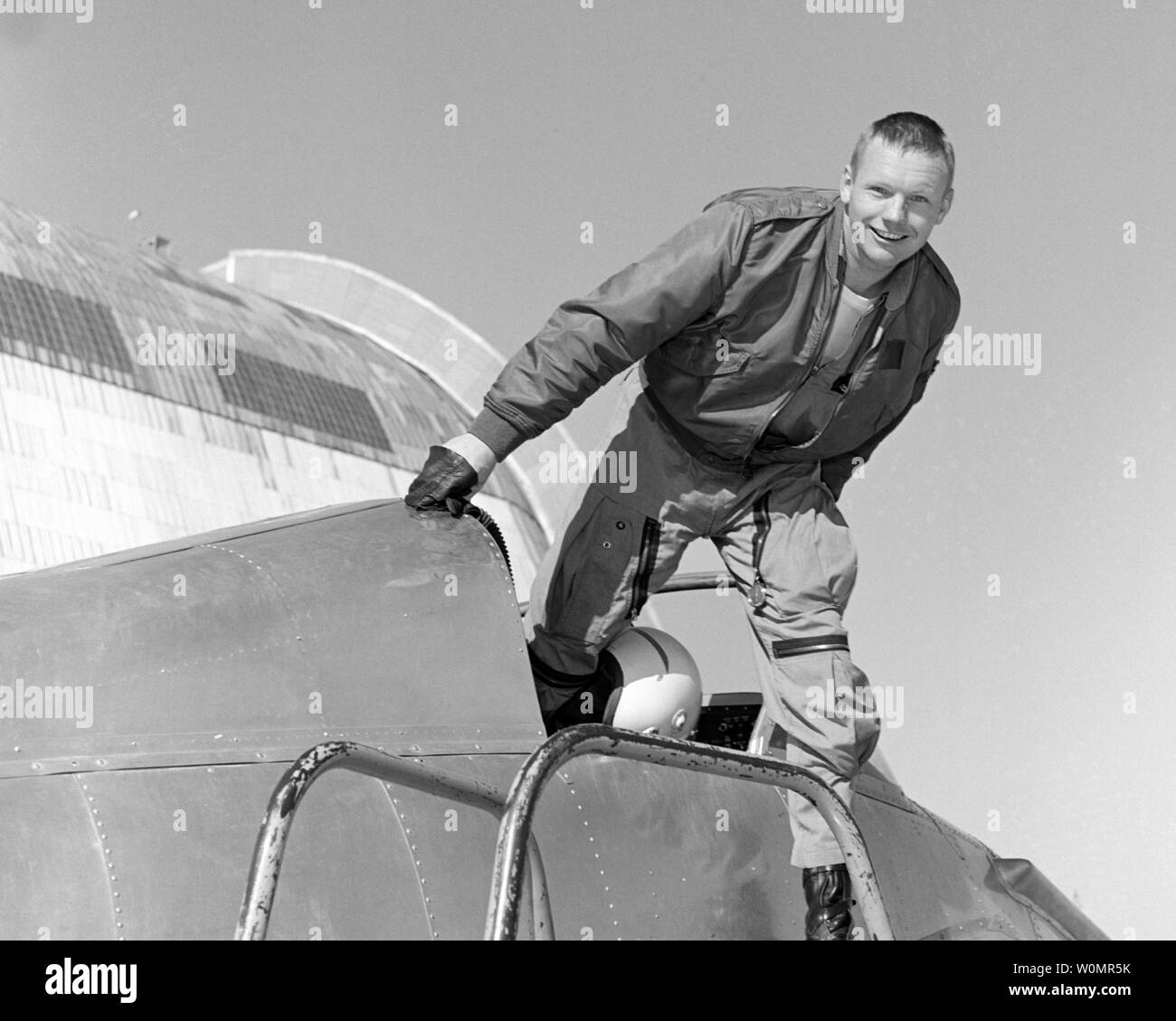 Neil Armstrong is photographed in the cockpit of the Ames Bell X-14 aircraft at NASA's Ames Research Center. Armstrong, the first man to walk on the moon, was born in Wapakoneta, Ohio, on August 5, 1930. Armstrong joined the National Advisory Committee for Aeronautics (NACA) in 1955. Over the next 17 years, he was an engineer, test pilot, astronaut and administrator for NACA and its successor agency, the National Aeronautics and Space Administration (NASA). He was assigned as command pilot for the Gemini 8 mission, performing the first successful docking of two vehicles in space. As spacecraft Stock Photo