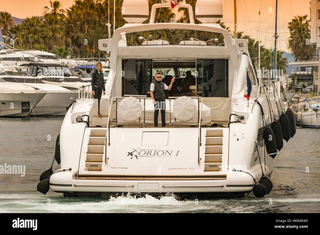 CANNES, FRANCE - APRIL 2019: Luxury motor yacht Orion I reversing into its harbour berth in Cannes. Stock Photo