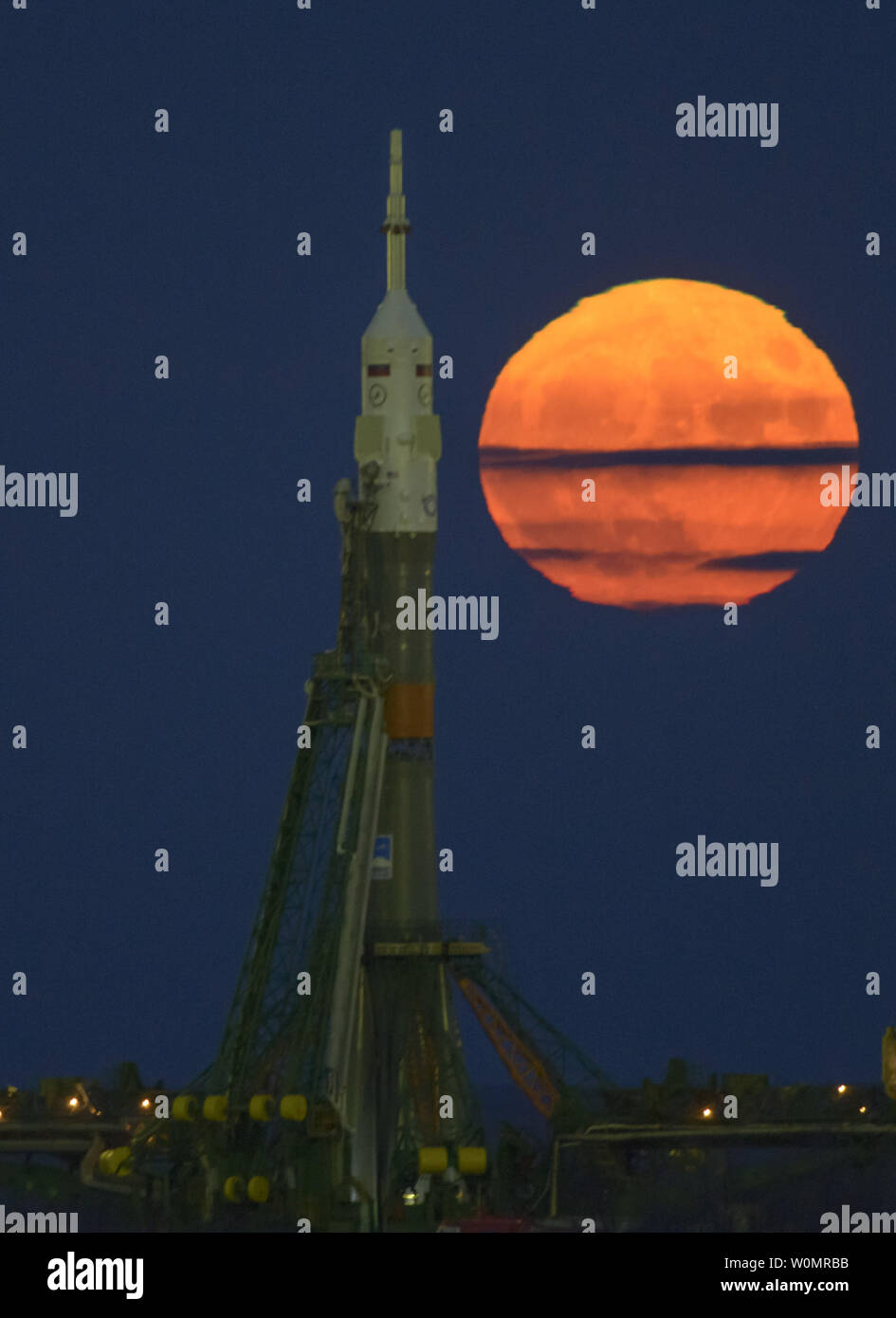 The moon, or supermoon, is seen rising behind the Soyuz rocket at the Baikonur Cosmodrome launch pad in Kazakhstan, on Monday, November 14, 2016. NASA astronaut Peggy Whitson, Russian cosmonaut Oleg Novitskiy of Roscosmos, and ESA astronaut Thomas Pesquet will launch from the Baikonur Cosmodrome in Kazakhstan the morning of November 18 (Kazakh time). All three will spend approximately six months on the orbital complex.  A supermoon occurs when the moon's orbit is closest (perigee) to Earth. NASA Photo by Bill Ingalls/UPI Stock Photo