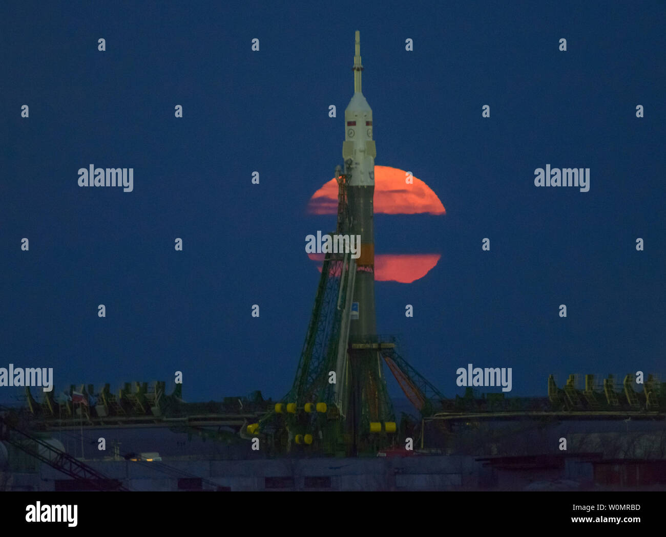 The moon, or supermoon, is seen rising behind the Soyuz rocket at the Baikonur Cosmodrome launch pad in Kazakhstan, on Monday, November 14, 2016. NASA astronaut Peggy Whitson, Russian cosmonaut Oleg Novitskiy of Roscosmos, and ESA astronaut Thomas Pesquet will launch from the Baikonur Cosmodrome in Kazakhstan the morning of November 18 (Kazakh time). All three will spend approximately six months on the orbital complex.  A supermoon occurs when the moon's orbit is closest (perigee) to Earth. NASA Photo by Bill Ingalls/UPI Stock Photo