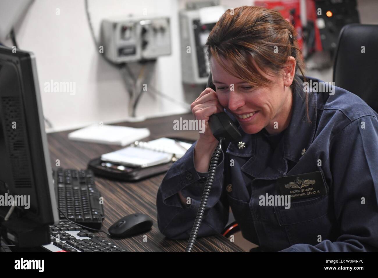 Cmdr. Andria L. Slough, commanding officer of the guided-missile destroyer USS Porter (DDG 78), receives a telephone call from President Donald J. Trump, April 9, 2017. Porter, forward-deployed to Rota, Spain, is conducting naval operations in the U.S. 6th Fleet area of operations in support of U.S. national security interests in Europe. Photo by Navy Mass Communication Specialist 3rd Class Ford Williams/UPI Stock Photo