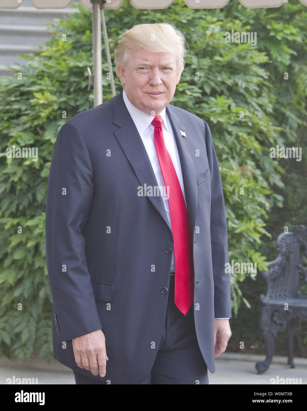 United States President Donald J. Trump departs the White House in Washington, DC to participate in the commissioning ceremony for the USS Gerald R. Ford (CVN-78), the latest US Navy supercarrier, on July 22, 2017.         Photo by Ron Sachs/UPI Stock Photo