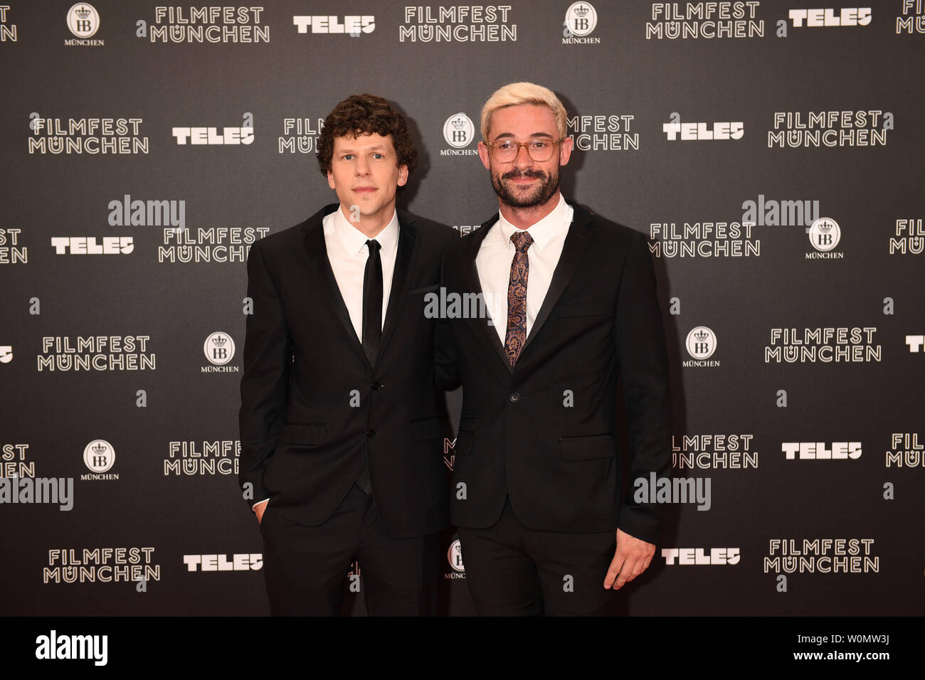 Munich, Germany. 27th June, 2019. Director Riley Stearns (r) and actor  Jesse Eisenberg are standing on the red carpet of the Filmfest Munich,  which opens with the comedy The Art of Self-Defense