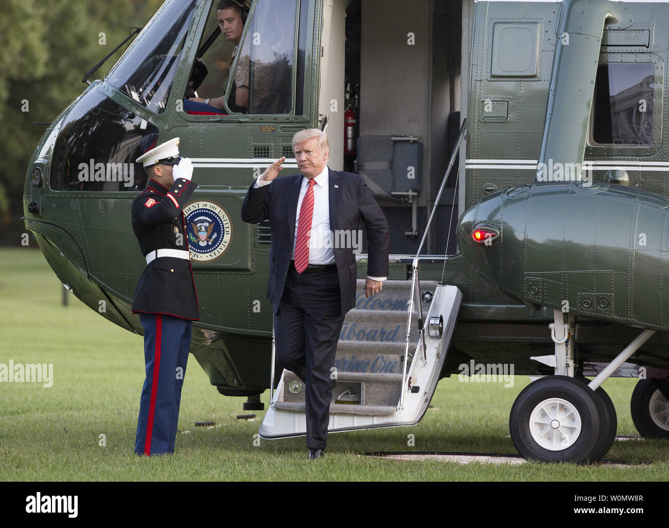 U.S. President Donald J. Trump returns the The White House in ...