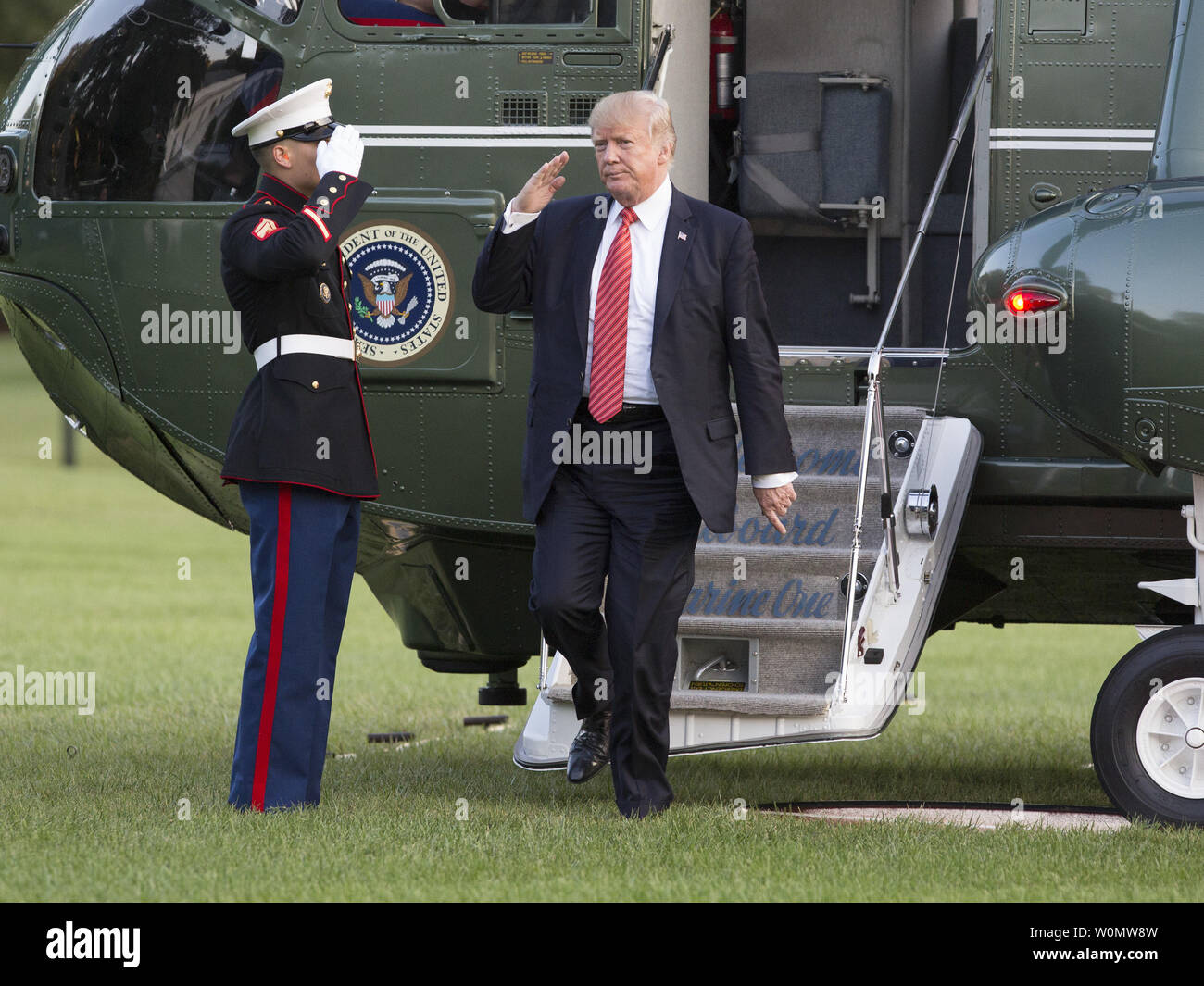 U.S. President Donald J. Trump returns the The White House in ...